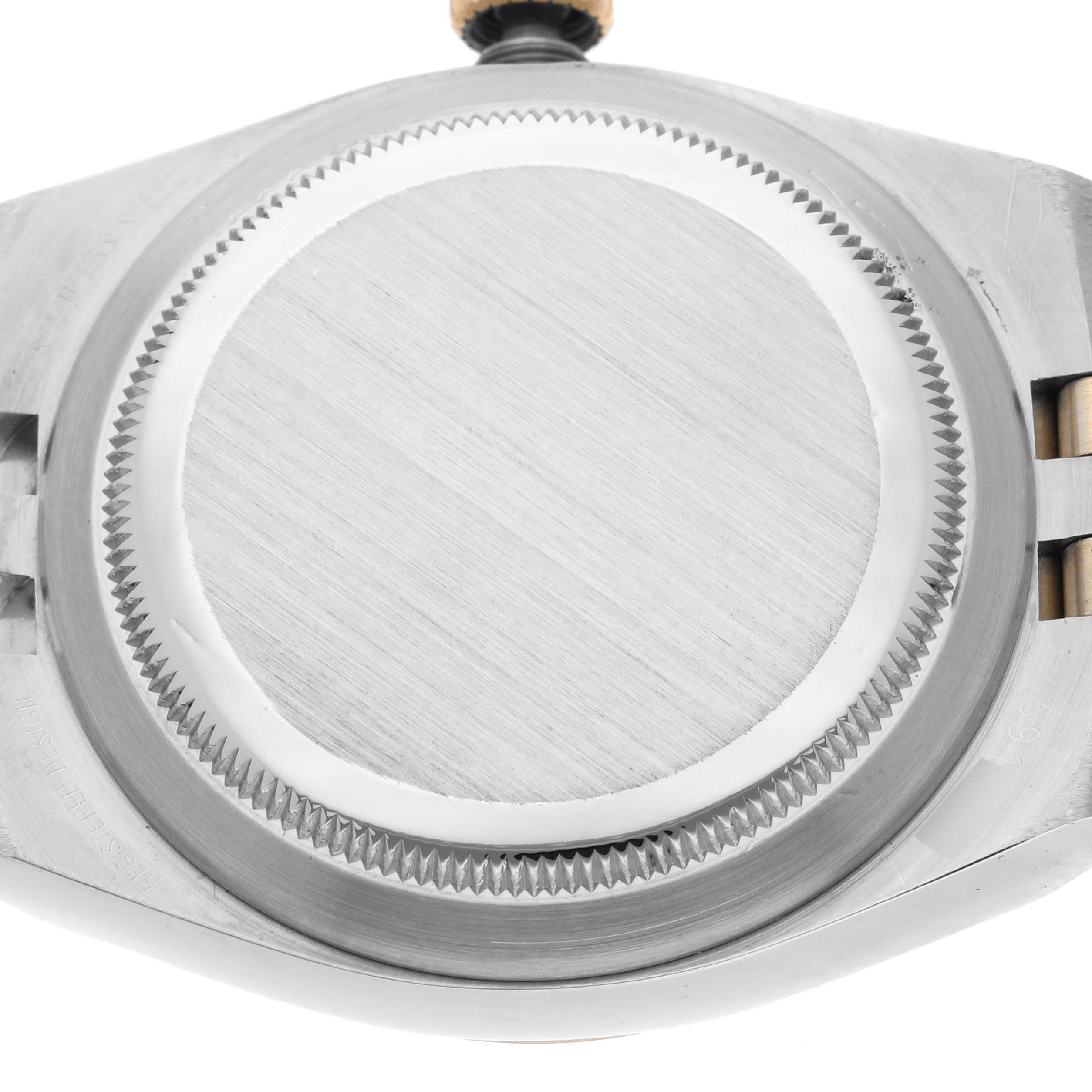 The image shows the case back and crown of a Rolex Oysterquartz 17013 Men
s Steel and Gold (two tone) White Dial 17013 Men
s Steel and Gold (two tone) White Dial watch from a top-down perspective.