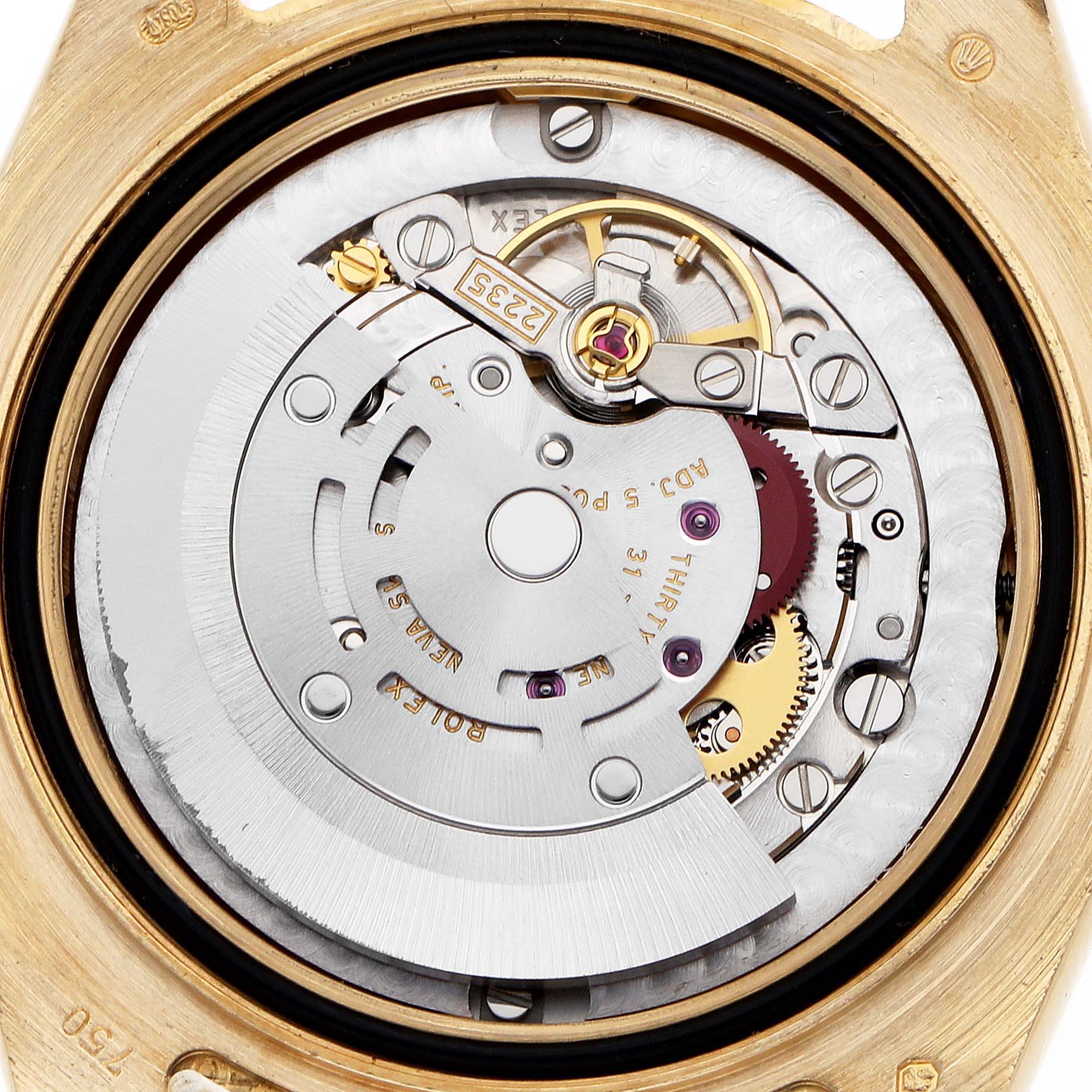 The image shows the movement of the Rolex Pearlmaster 81298 Women
s Yellow Gold Mother of Pearl Dial watch from a top-down angle, highlighting its intricate mechanical components.