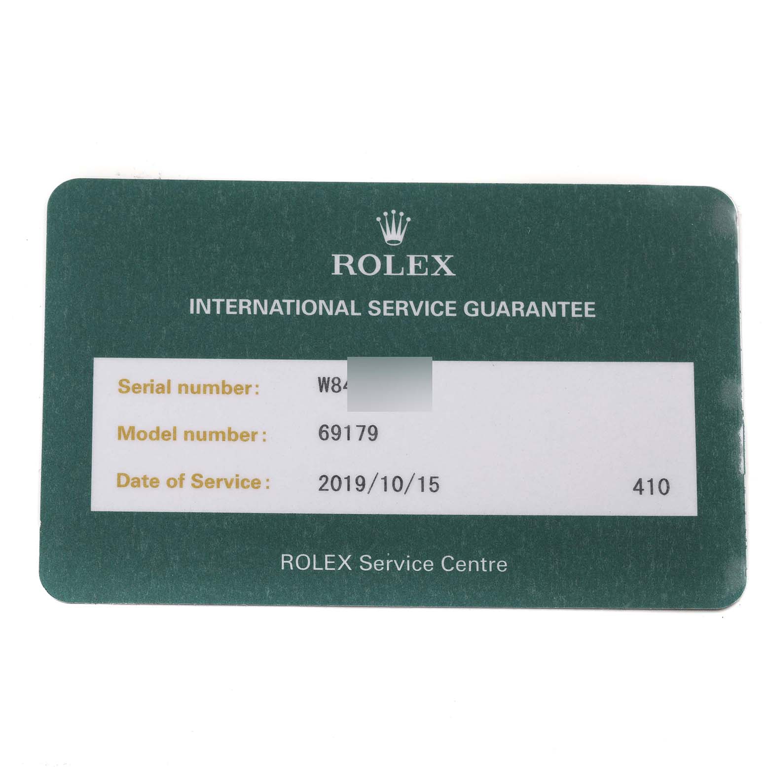 The image shows a green Rolex International Service Guarantee card for the Rolex President 69179 Women
s White Gold Silver Dial 69179 Women
s White Gold Silver Dial model 69179.