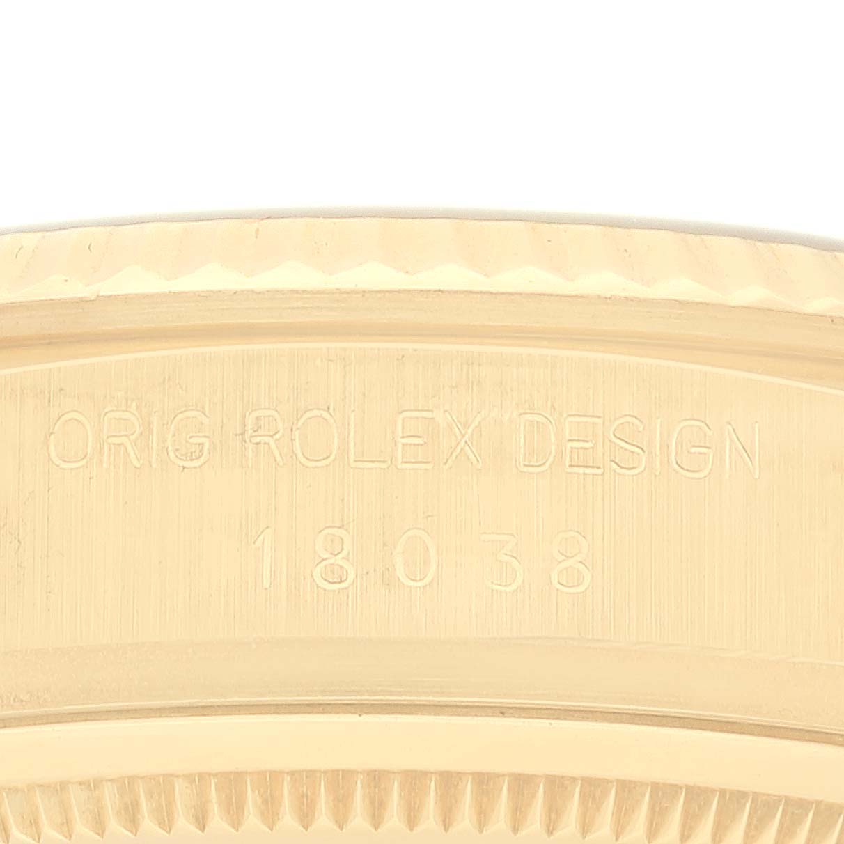 This image shows a close-up of the case side, featuring engravings that include the model number "18038" of the Rolex President 18038 Men's Yellow Gold Champagne Dial 18038 Men's Yellow Gold Champagne Dial watch.