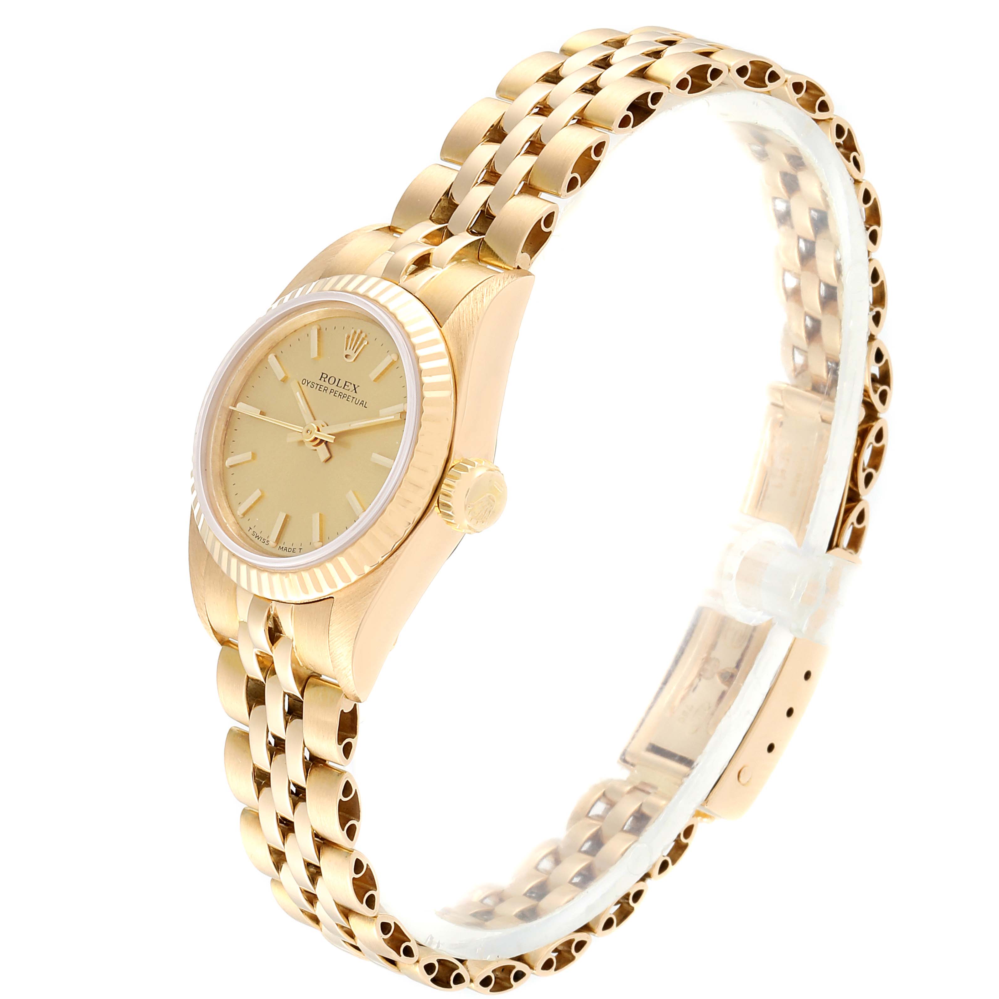 This image shows a side and slightly angled view of a Rolex President 67198 Women
s Yellow Gold Champagne Dial 67198 Women
s Yellow Gold Champagne Dial model watch, highlighting its gold case, dial, and bracelet.