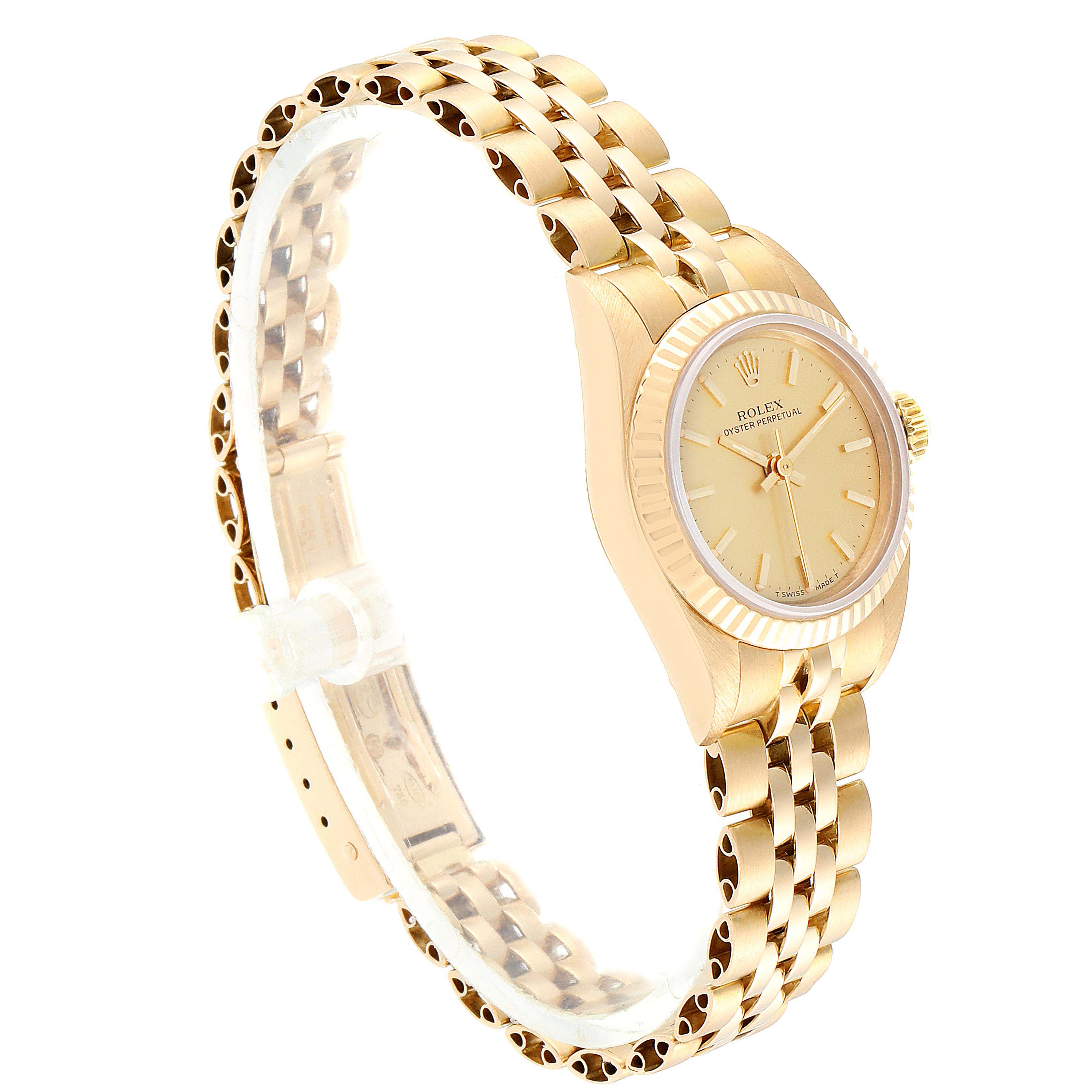 The image shows a side view of a Rolex President 67198 Women
s Yellow Gold Champagne Dial 67198 Women
s Yellow Gold Champagne Dial model watch, highlighting the gold watch face, bezel, and bracelet.