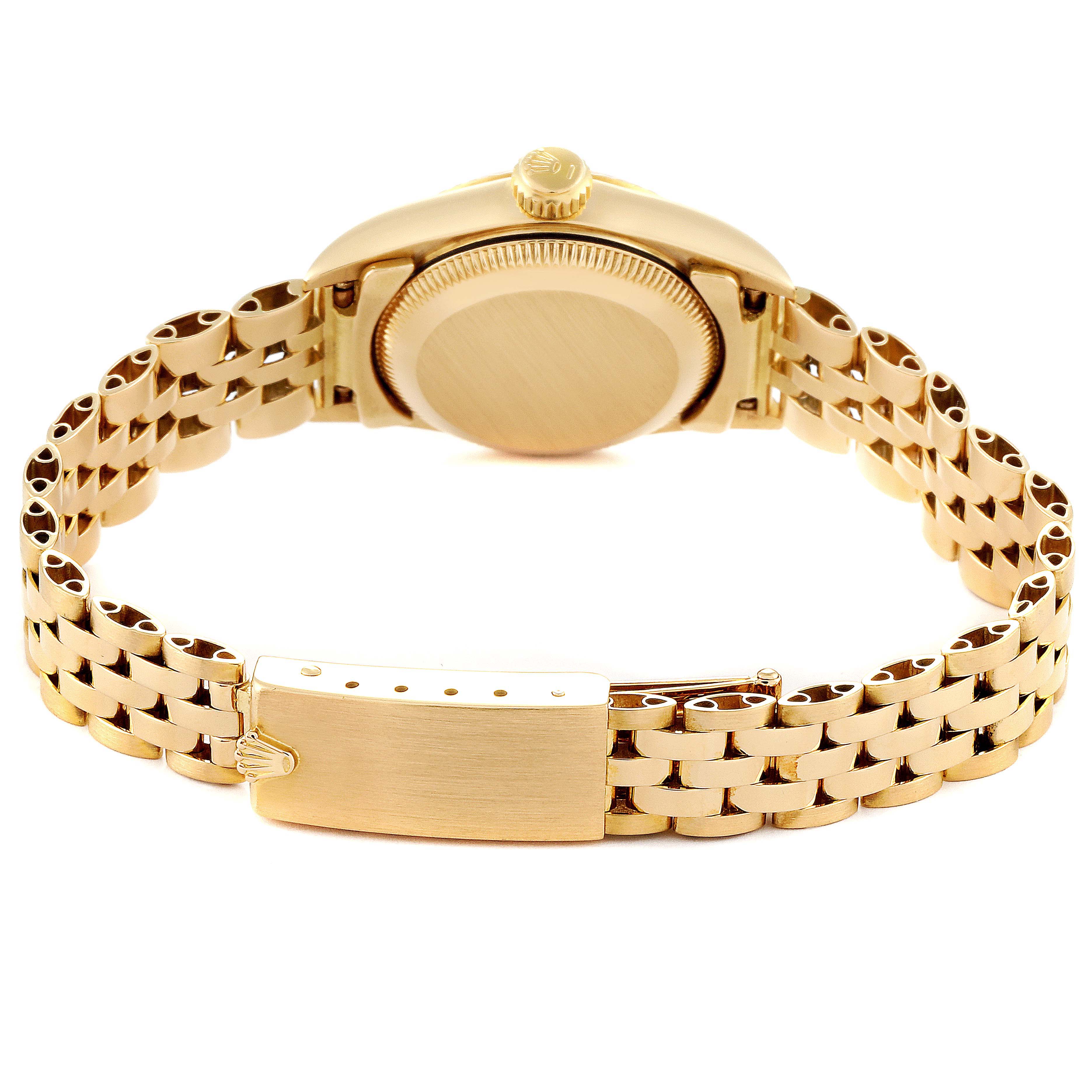This image shows the back view of the Rolex President 67198 Women
s Yellow Gold Champagne Dial 67198 Women
s Yellow Gold Champagne Dial model watch, focusing on the bracelet and clasp.