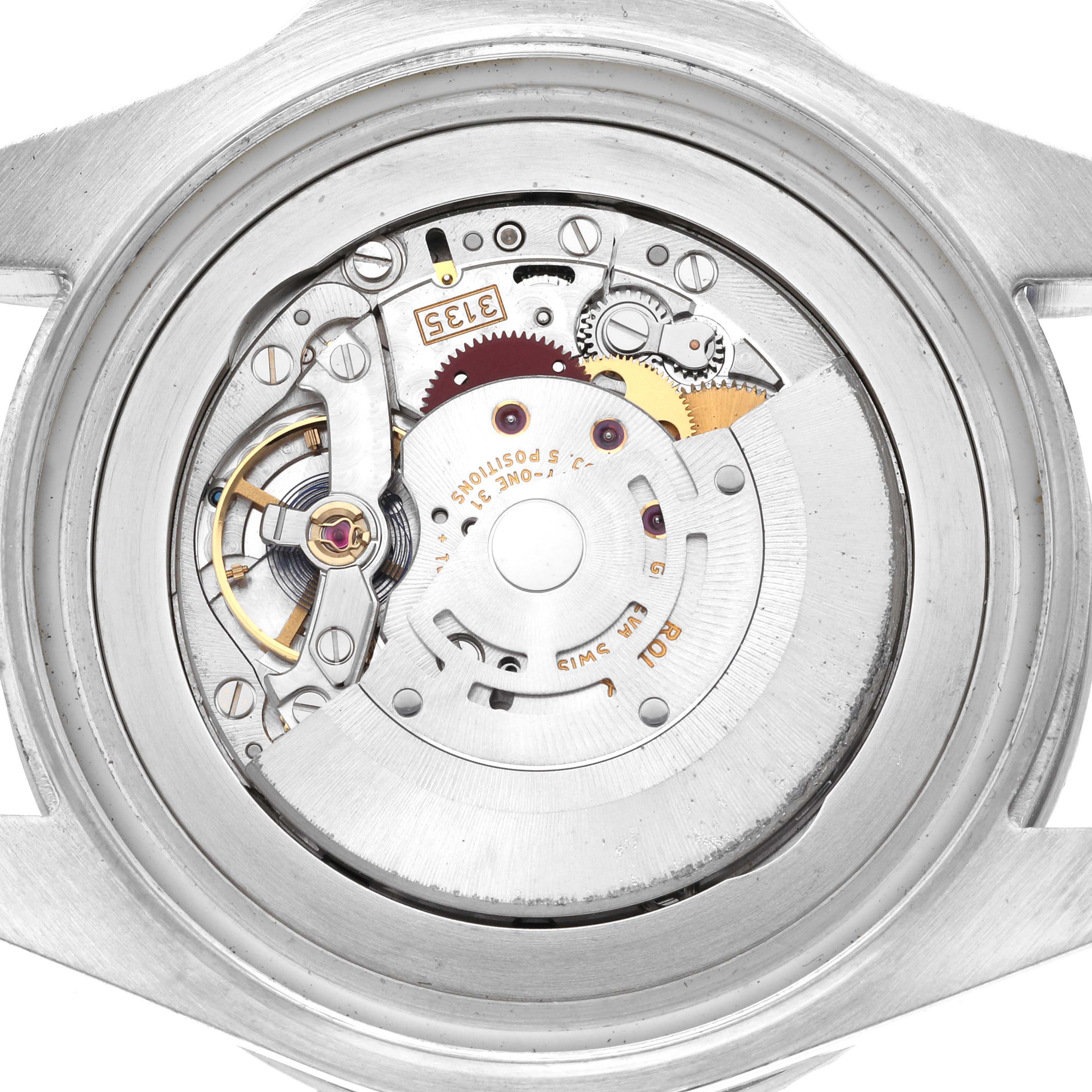 The image shows the internal mechanism of a Rolex Sea-Dweller 116660 Men's Stainless Steel Black Dial watch from the back, revealing gears and movement components.