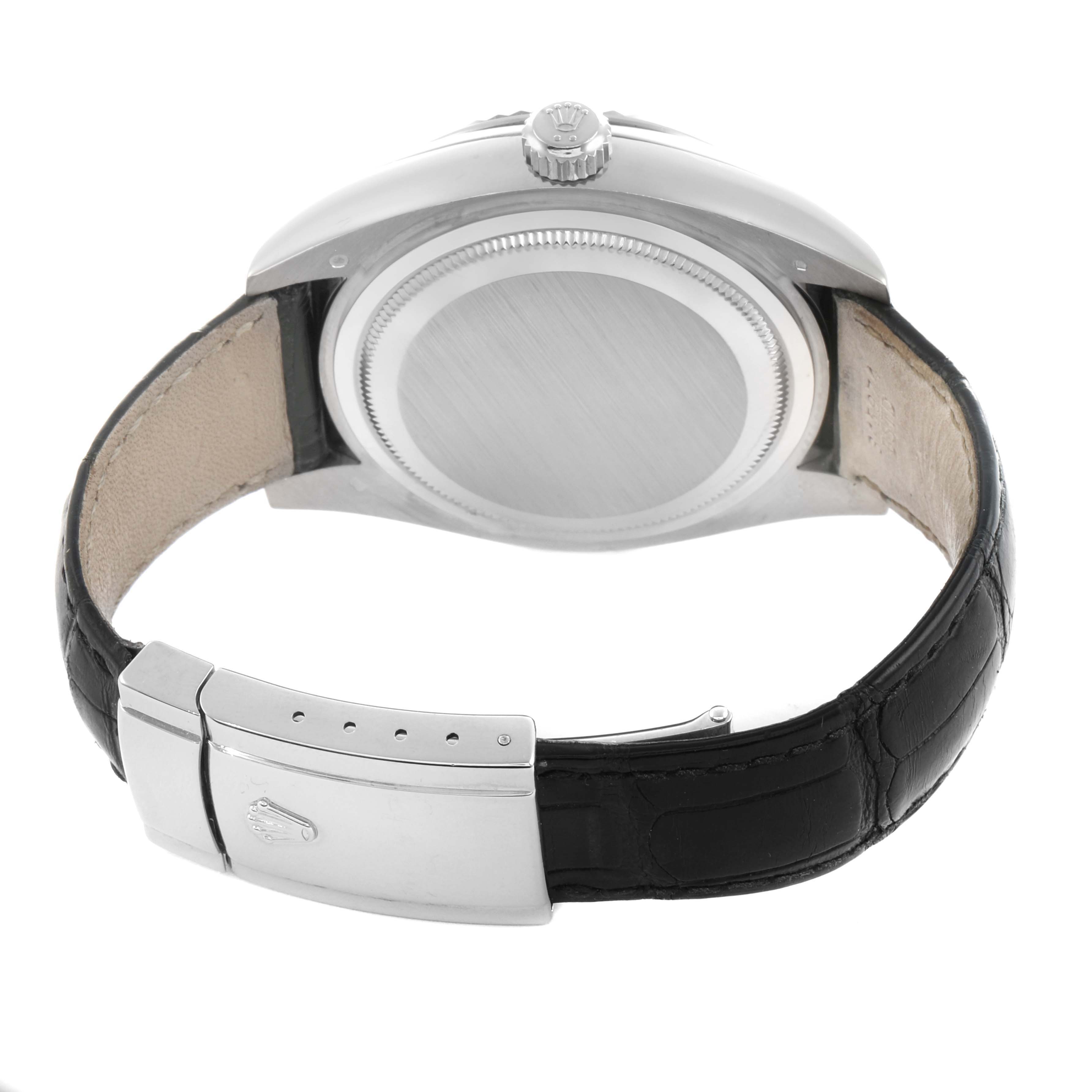 The image shows the back of a Rolex Sky-Dweller 326139 Men
s White Gold Beige Dial watch, highlighting the case back, crown, and leather strap clasp.