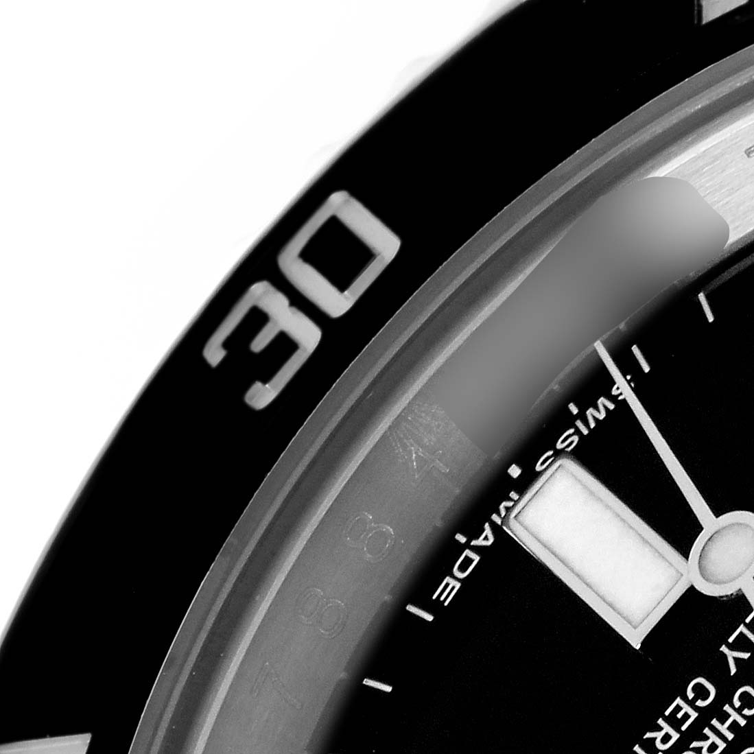 This close-up image of the Rolex Submariner 116610 Men
s Stainless Steel Black Dial 116610 Men
s Stainless Steel Black Dial watch shows the bezel reading "30" and part of the dial.