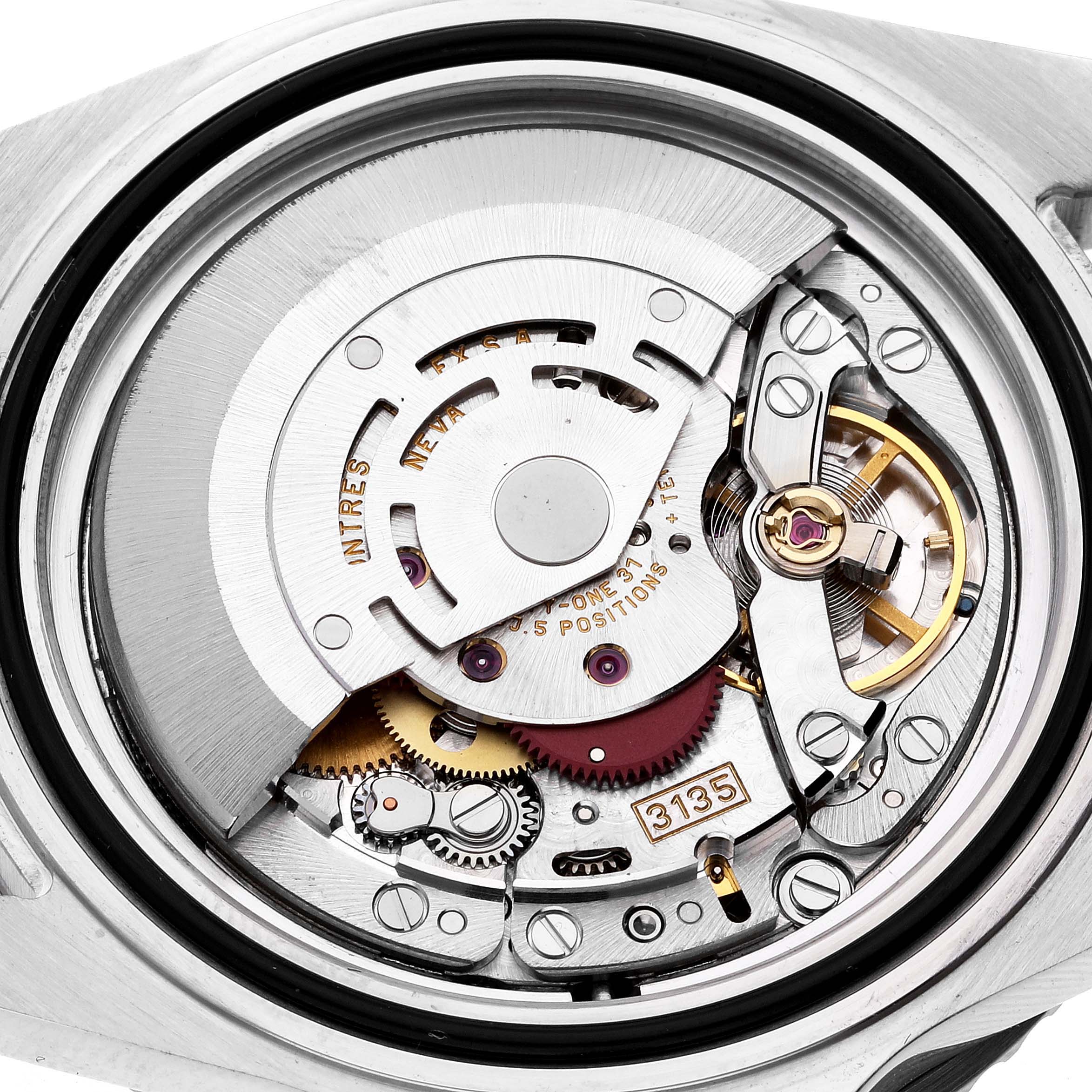 The image shows the interior mechanism and movement parts of the Rolex Submariner 16610 Men
s Stainless Steel Black Dial 16610 Men
s Stainless Steel Black Dial watch from the back.