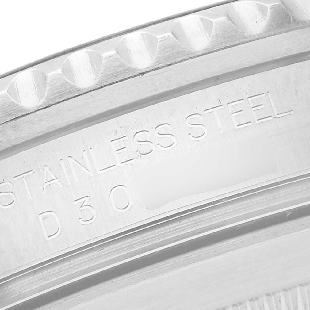 The image shows a close-up of the stainless steel bezel and case of the Rolex Submariner 16610 Men
s Stainless Steel Black Dial 16610 Men
s Stainless Steel Black Dial watch.