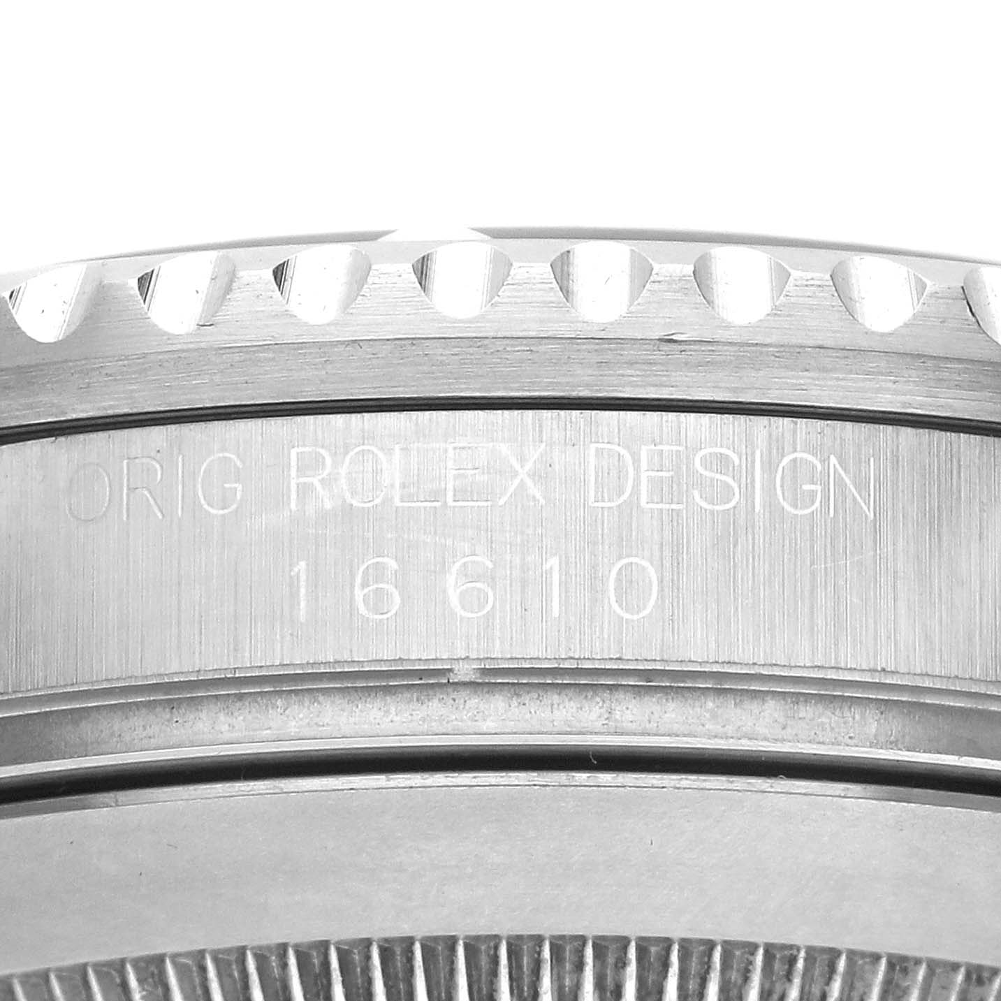 The image shows the side view of a Rolex Submariner 116610 Men
s Stainless Steel Black Dial 16610, highlighting the engraved bezel and case details.