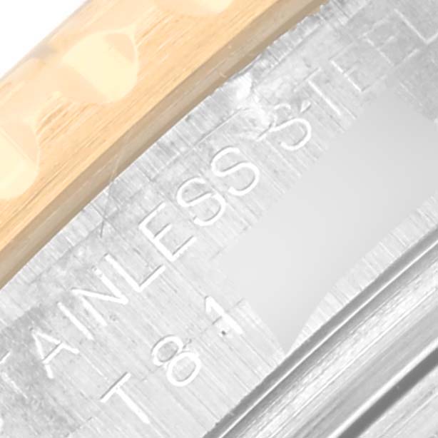 The image shows a close-up of the Yacht-Master Rolex watch's metal casing with etched text.