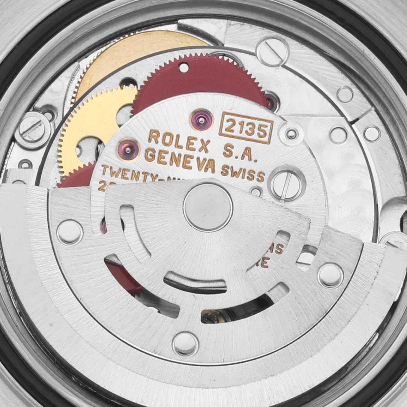 The image shows the movement mechanism of the Rolex Yacht-Master 69623 Women's Steel and Gold (two tone) White Dial 69623 Women's Steel and Gold (two tone) White Dial watch, highlighting its intricate gears and rotors.