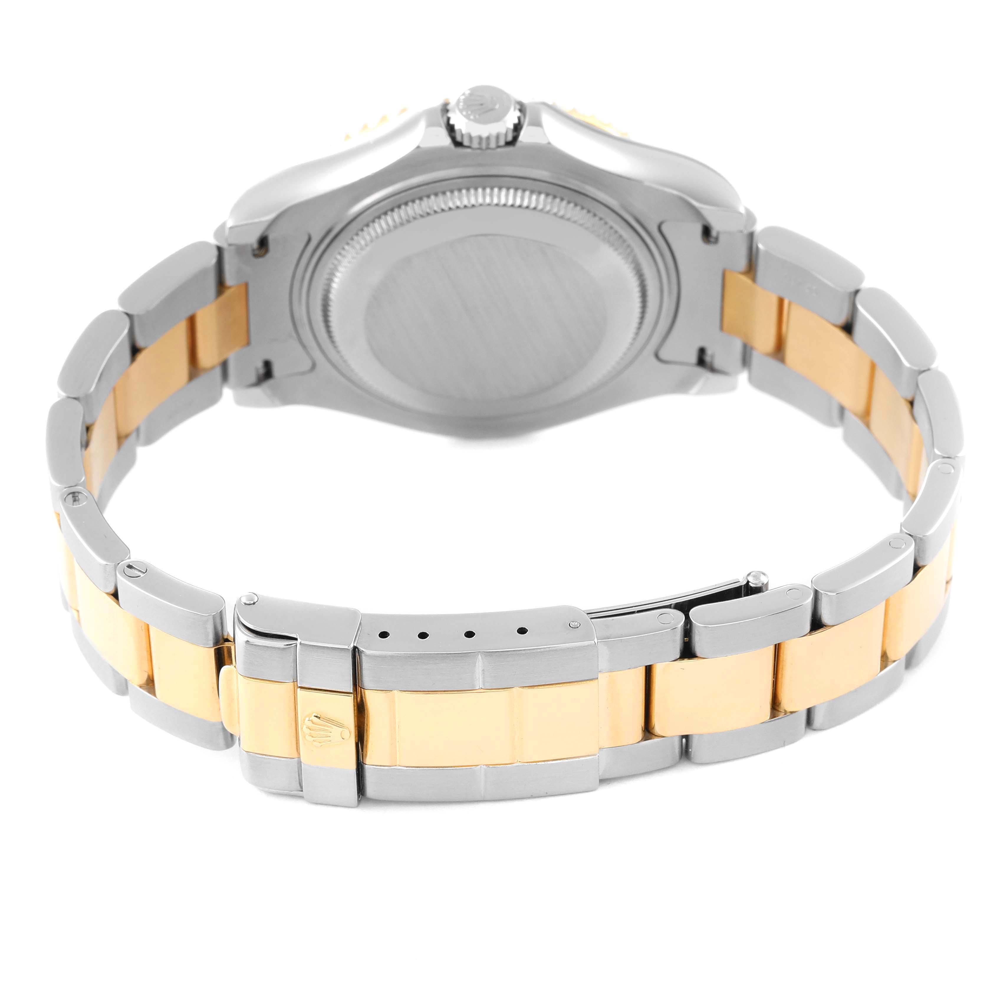 This image shows the back view of the Rolex Yacht-Master 68623 Men
s Steel and Gold (two tone) Champagne Dial 68623 Men
s Steel and Gold (two tone) Champagne Dial watch, highlighting the case back, crown, and two-tone bracelet with clasp.