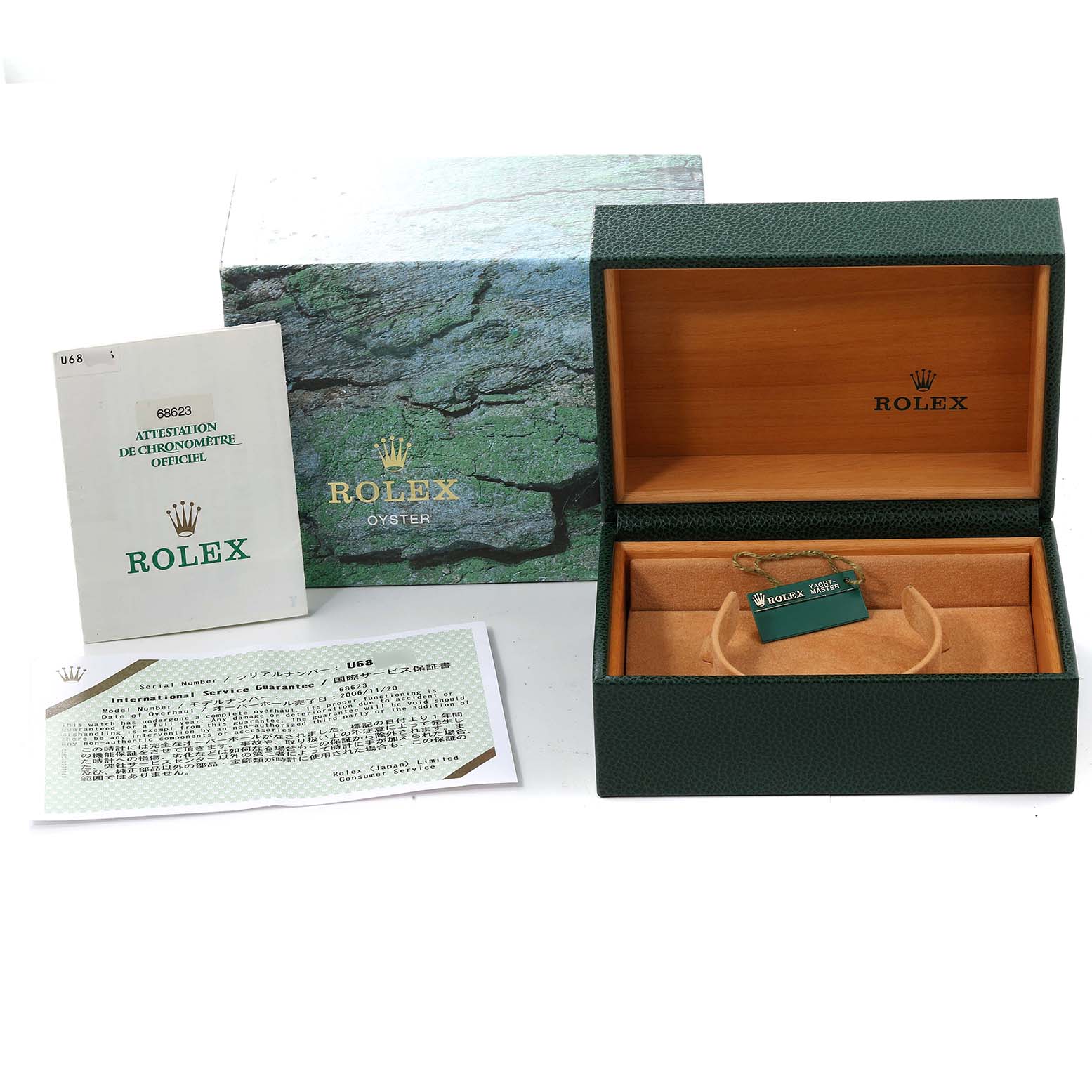 The image shows a Rolex Yacht-Master 68623 Men's Steel and Gold (two tone) White Dial 68623 Men's Steel and Gold (two tone) White Dial box, booklet, and tags from a top-down angle.