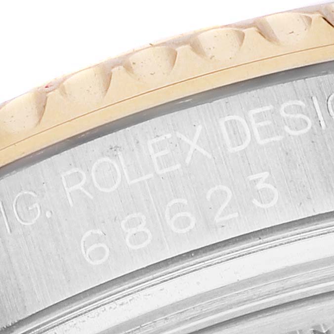 The image shows a close-up of the side of a Rolex Yacht-Master 68623 Men's Steel and Gold (two tone) White Dial 68623 Men's Steel and Gold (two tone) White Dial watch, highlighting the engraved model number and design name.