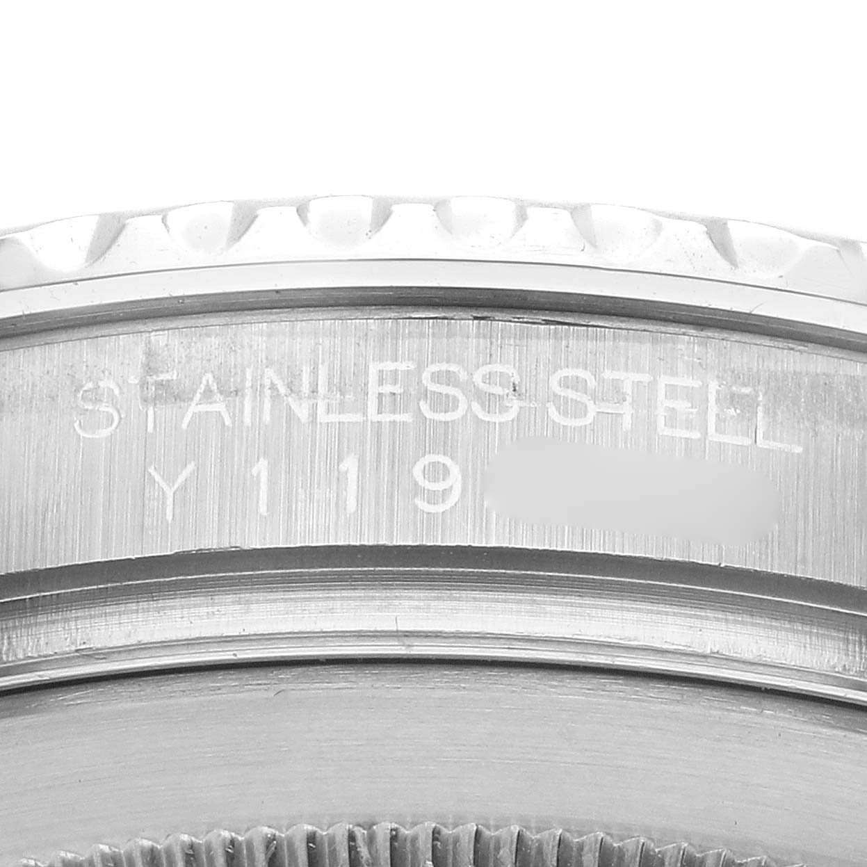 The image shows a close-up of the side of a Rolex Yacht-Master 16622 Men
s Stainless Steel Silver Dial watch, highlighting the stainless steel material and serial number engraving.