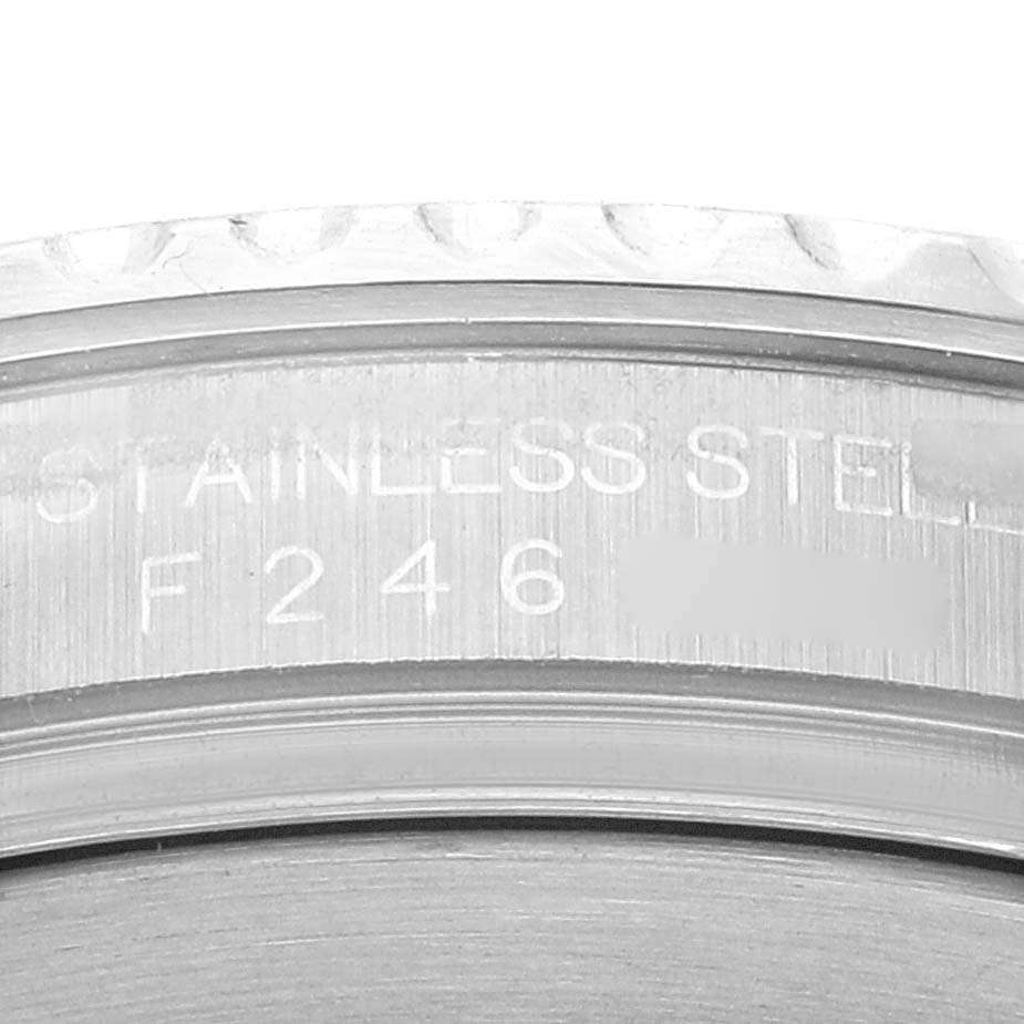 This close-up image shows the engravings on the stainless steel case back of a Rolex Yacht-Master 16622 Men's Stainless Steel Silver Dial 16622 Men's Stainless Steel Silver Dial watch.