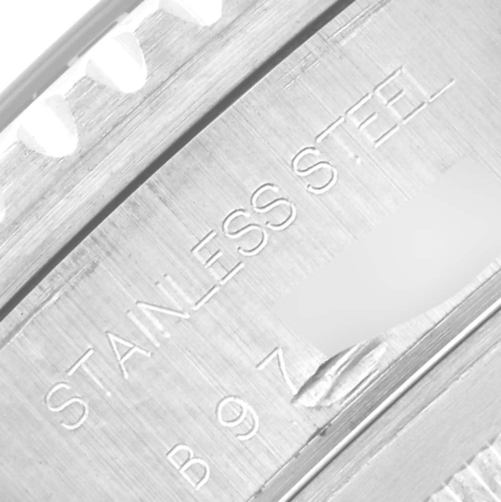 This is a close-up angle of the stainless steel case from a Tudor Prince model watch, including part of the bezel with teeth design.