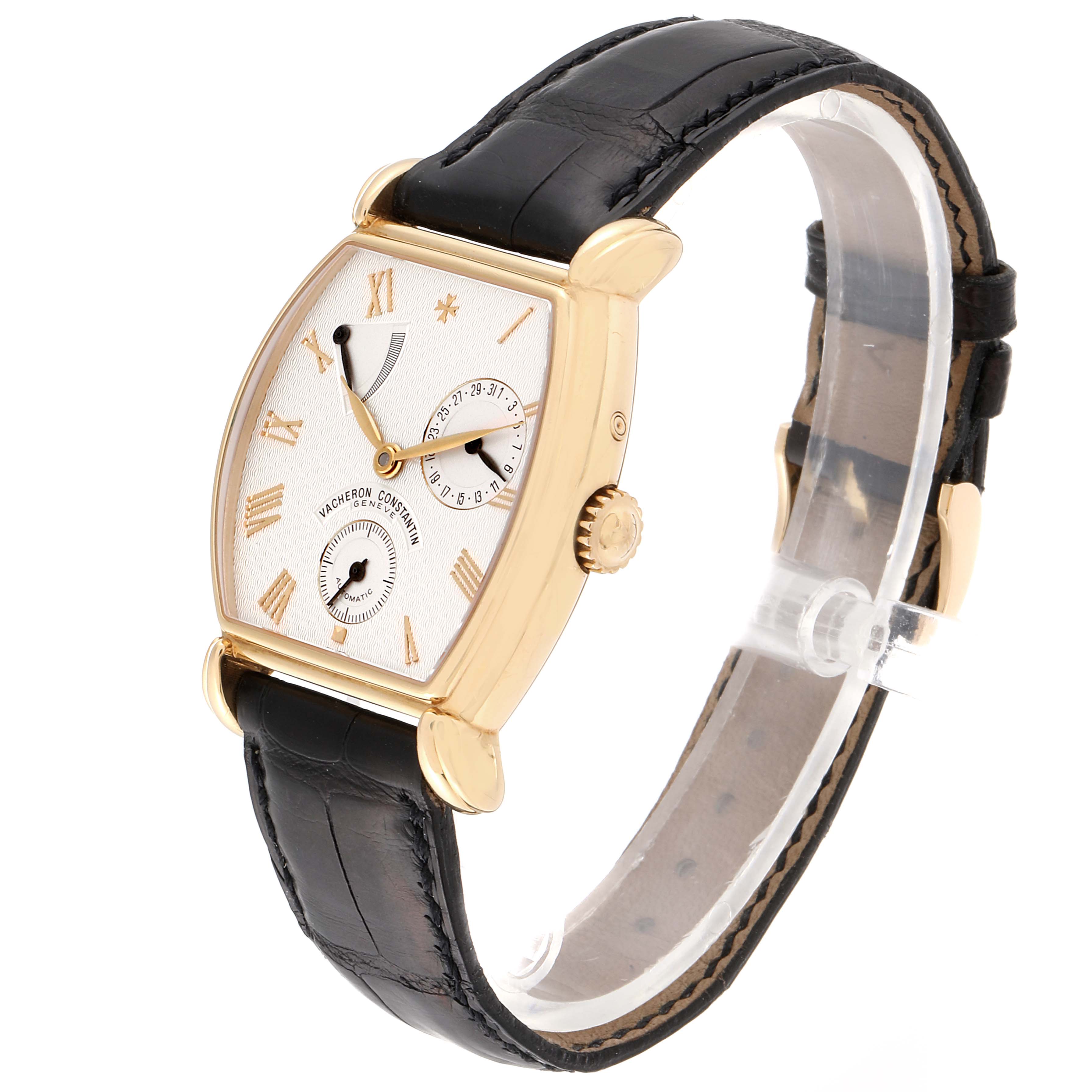 This Vacheron Constantin Vintage 47240 Men's Yellow Gold Silver Dial 47240 Men's Yellow Gold Silver Dial watch is shown in a side angle, displaying its gold case, white dial with subdials, and black leather strap.