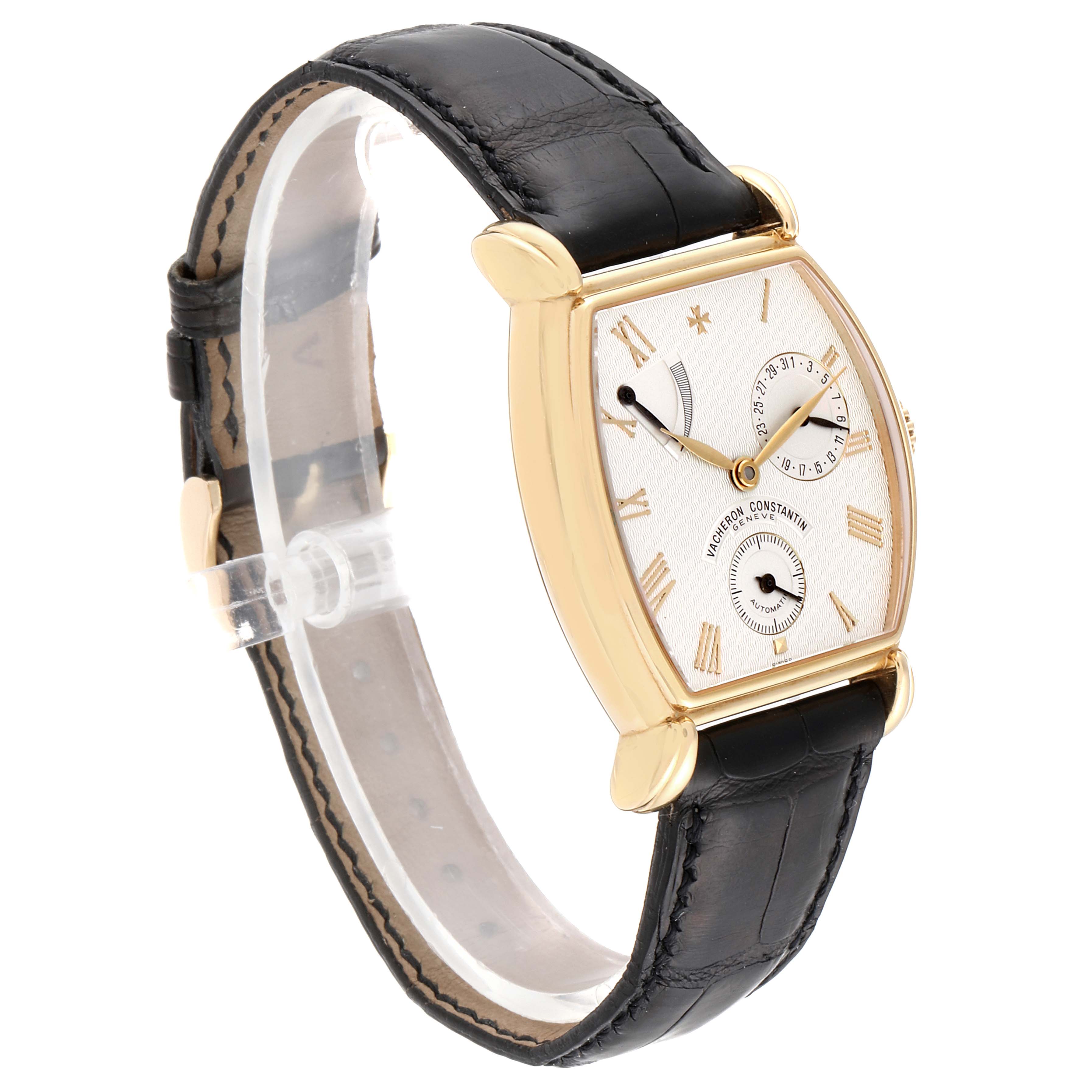 The image shows a side angle view of a Vacheron Constantin Vintage 47240 Men's Yellow Gold Silver Dial 47240 Men's Yellow Gold Silver Dial model watch with a black leather strap and gold casing.