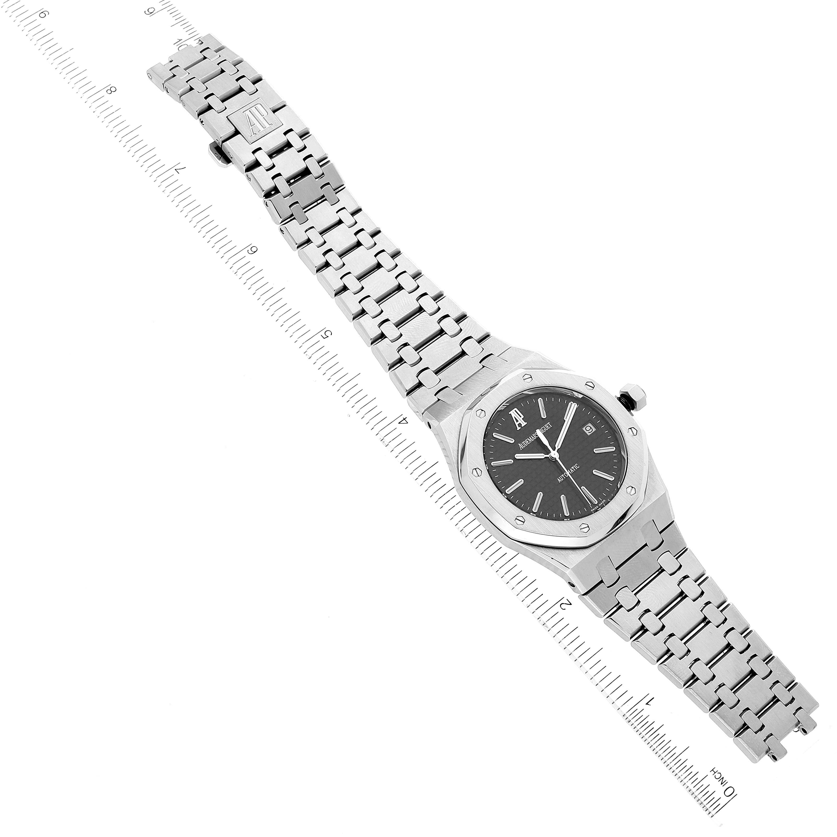 This is an overhead view of a Royal Oak watch by Audemars Piguet, showing the face, bezel, and entire bracelet.