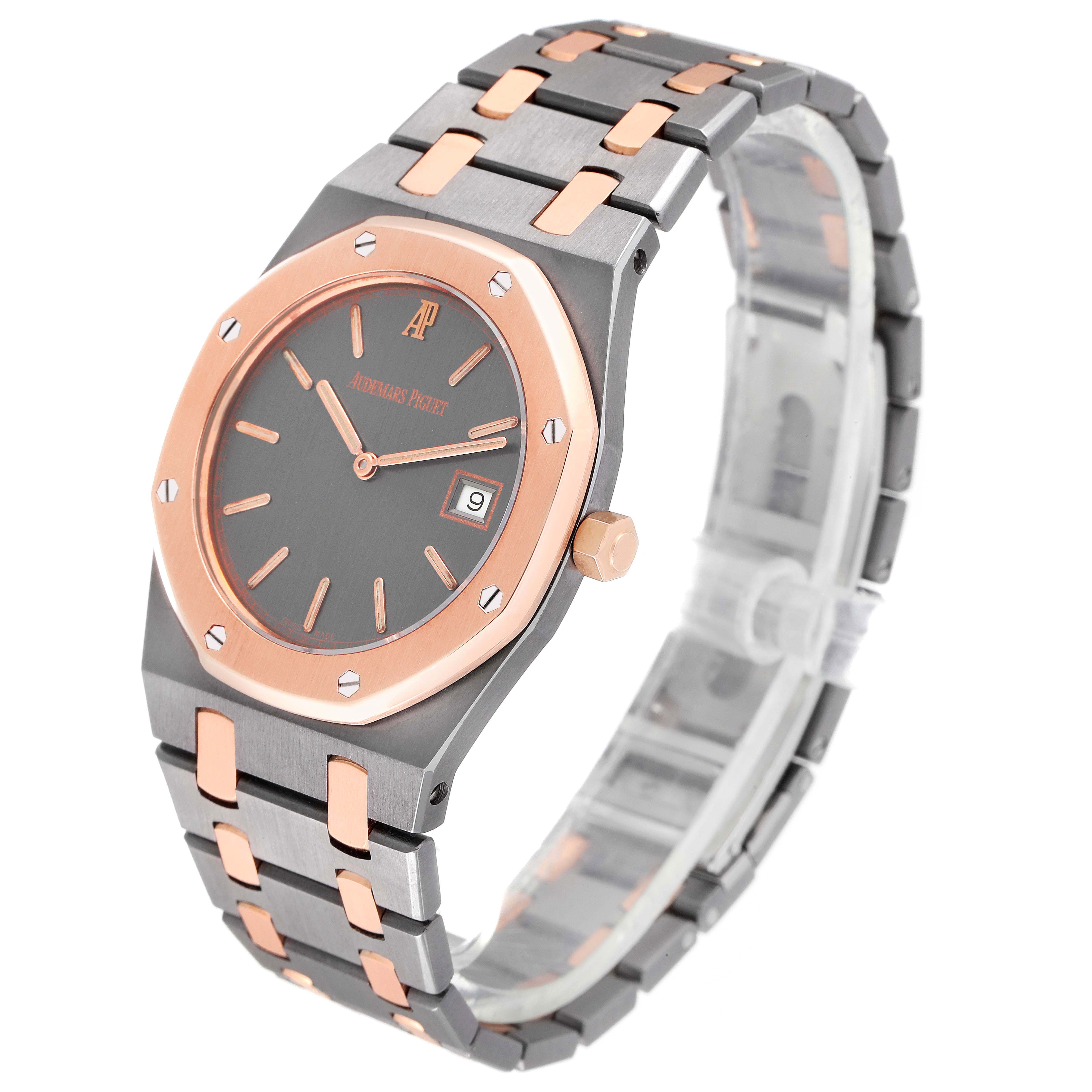 The Audemars Piguet Royal Oak 56175TR-OO-0789TR-01 Men's Steel and Gold (two tone) Black Dial 56175TR-OO-0789TR-01 Men's Steel and Gold (two tone) Black Dial watch is shown at an angled view, displaying its face, bezel, bracelet, and crown.