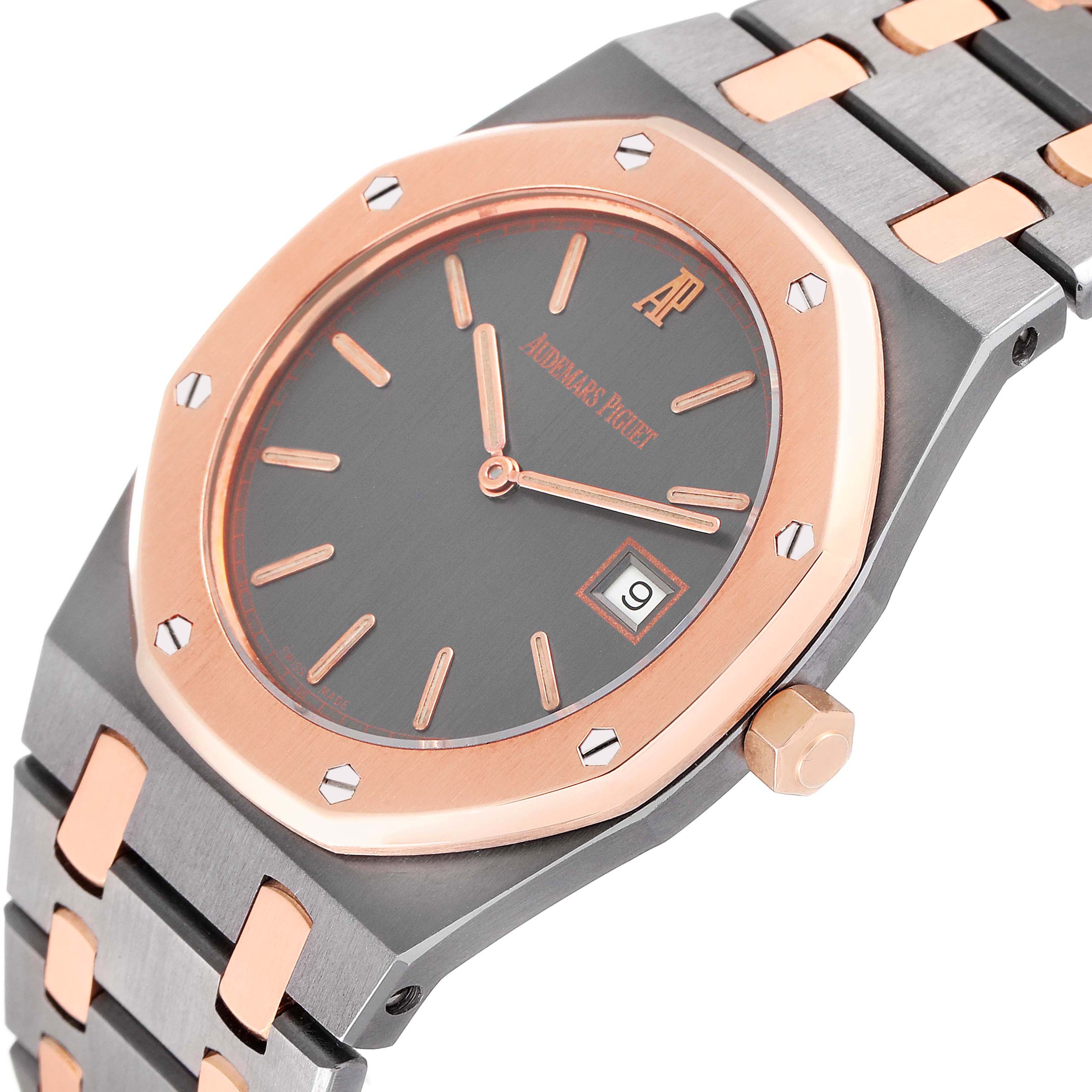 This image shows a close-up angle of the dial, bezel, and part of the bracelet of the Audemars Piguet Royal Oak 56175TR-OO-0789TR-01 Men's Steel and Gold (two tone) Black Dial 56175TR-OO-0789TR-01 Men's Steel and Gold (two tone) Black Dial watch.