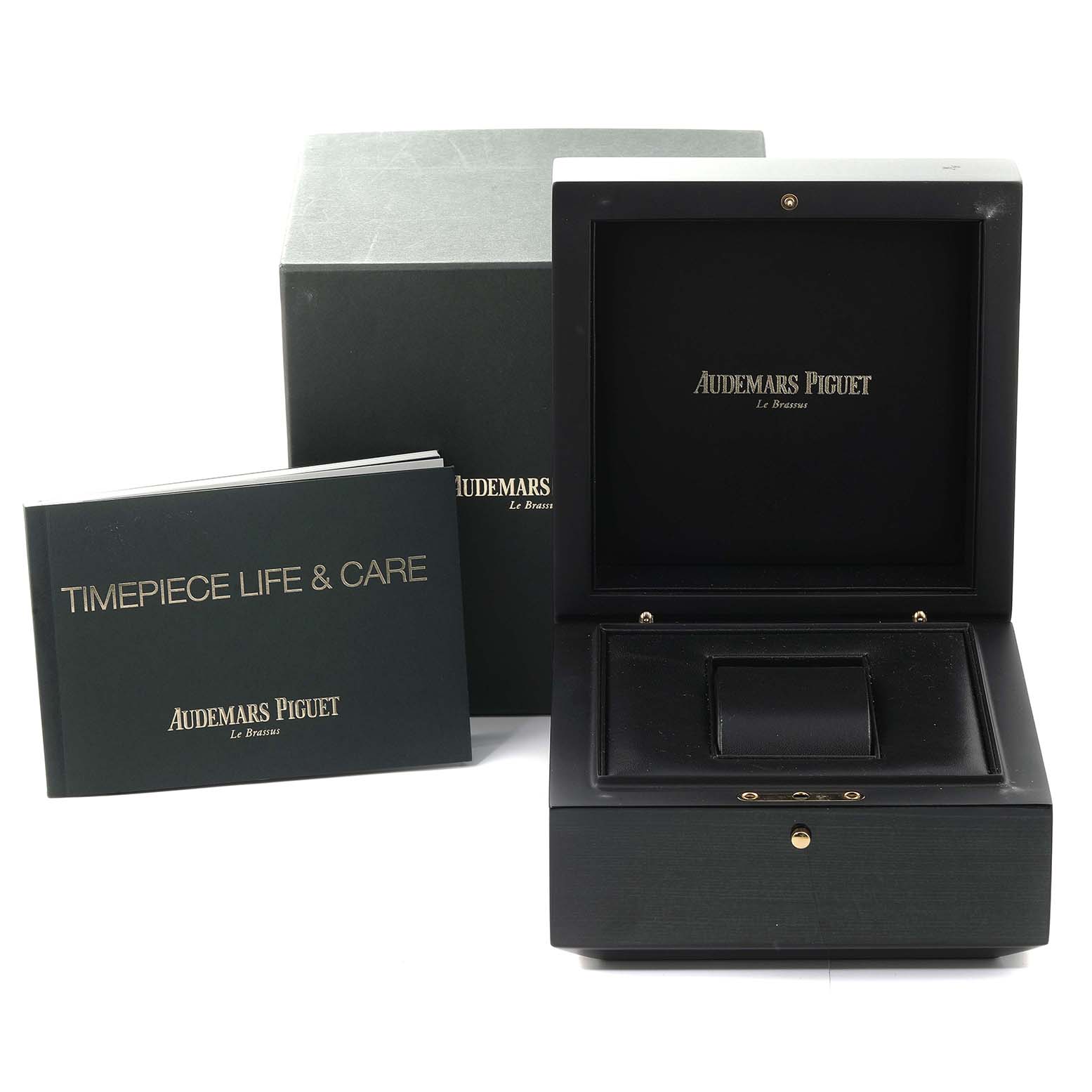The image shows the box and care manual for the Audemars Piguet Royal Oak 15202ST.OO.0944ST.01 Men's Stainless Steel Silver Dial 15202ST.OO.0944ST.01 Men's Stainless Steel Silver Dial watch.