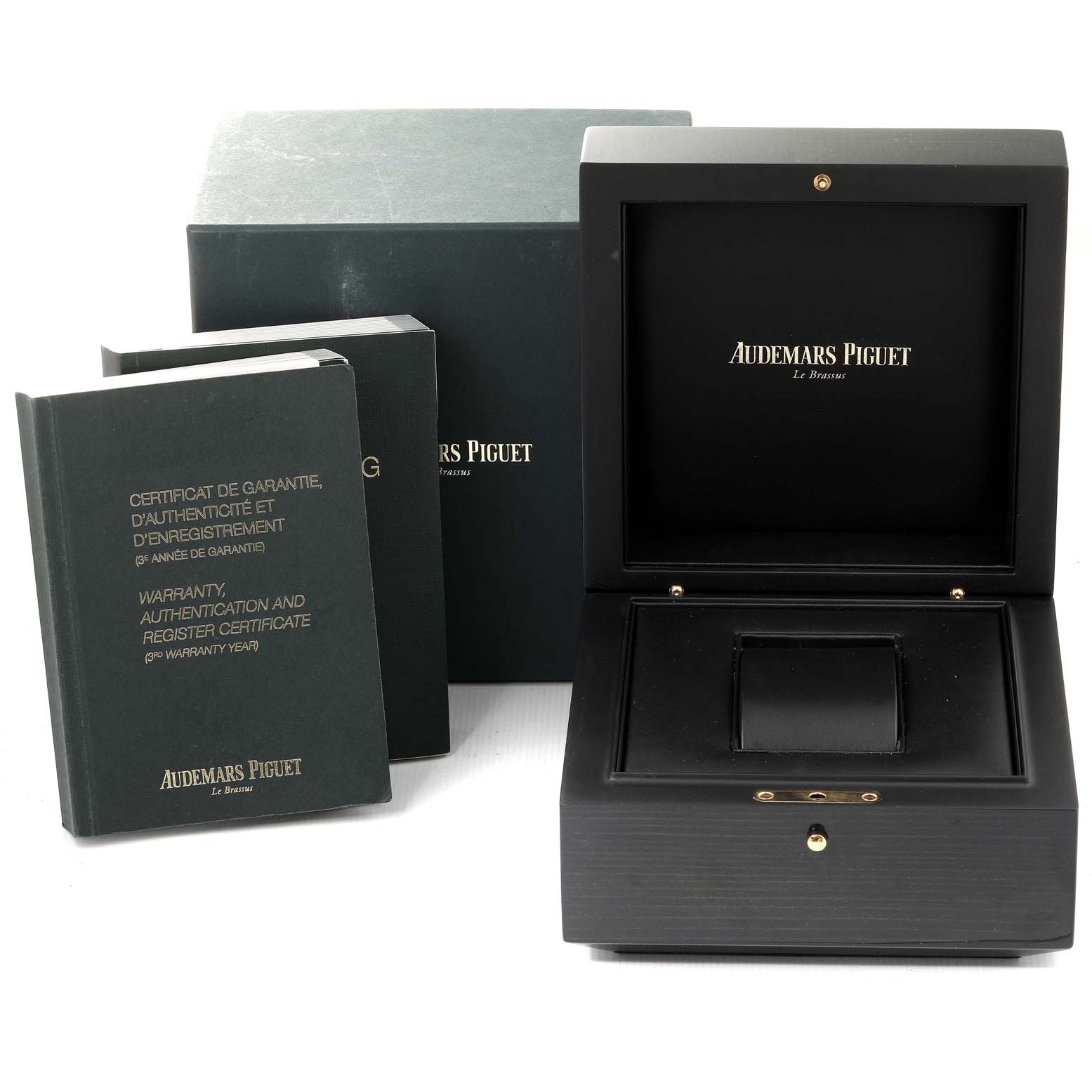 The image shows the opened box and warranty booklets for the Audemars Piguet Royal Oak 15400ST.OO.1220ST.02 Men's Stainless Steel White Dial 15400ST.OO.1220ST.02 Men's Stainless Steel White Dial watch.