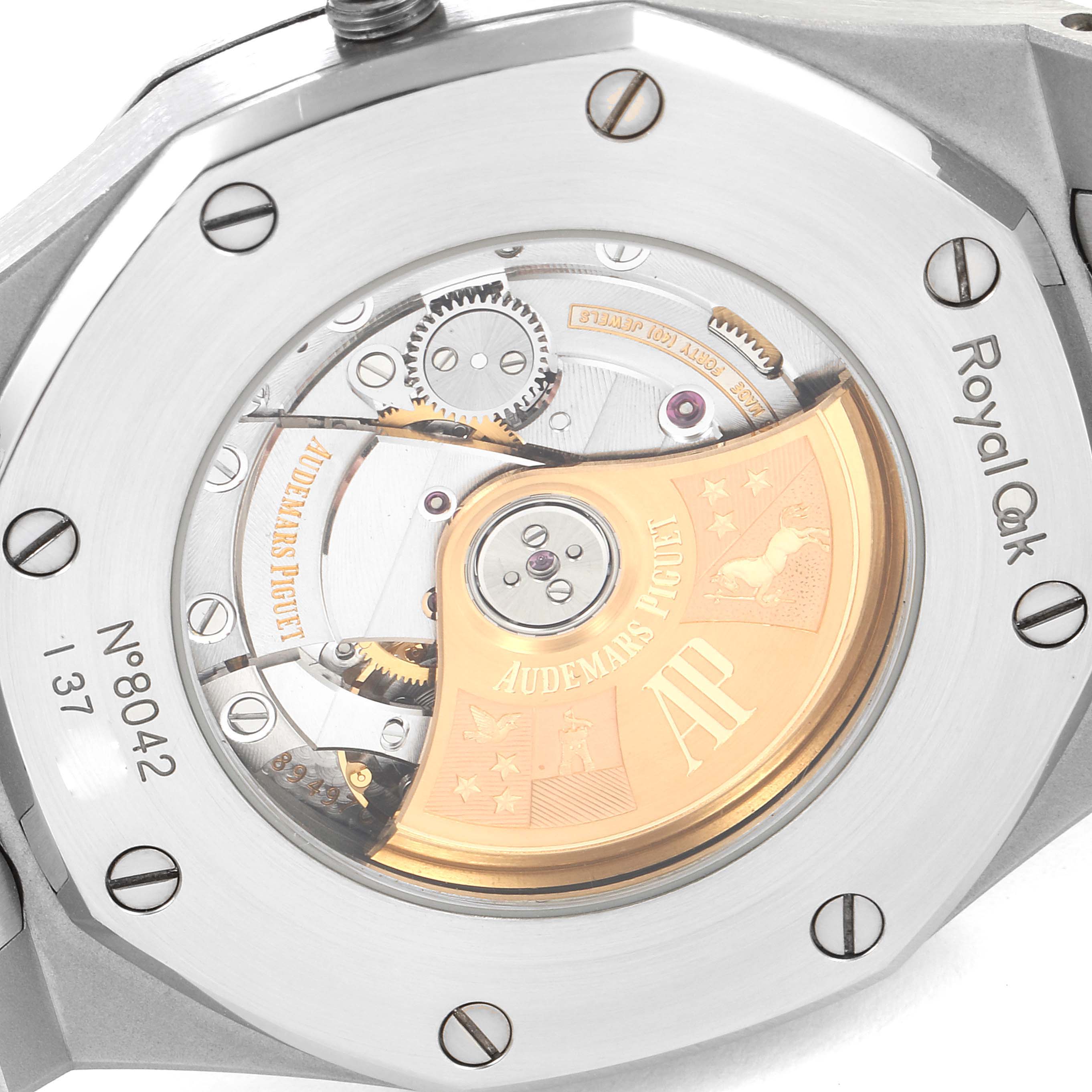 The image shows the back case of the Audemars Piguet Royal Oak 15400ST.OO.1220ST.02 Men's Stainless Steel White Dial 15400ST.OO.1220ST.02 Men's Stainless Steel White Dial watch, highlighting the movement and engravings.