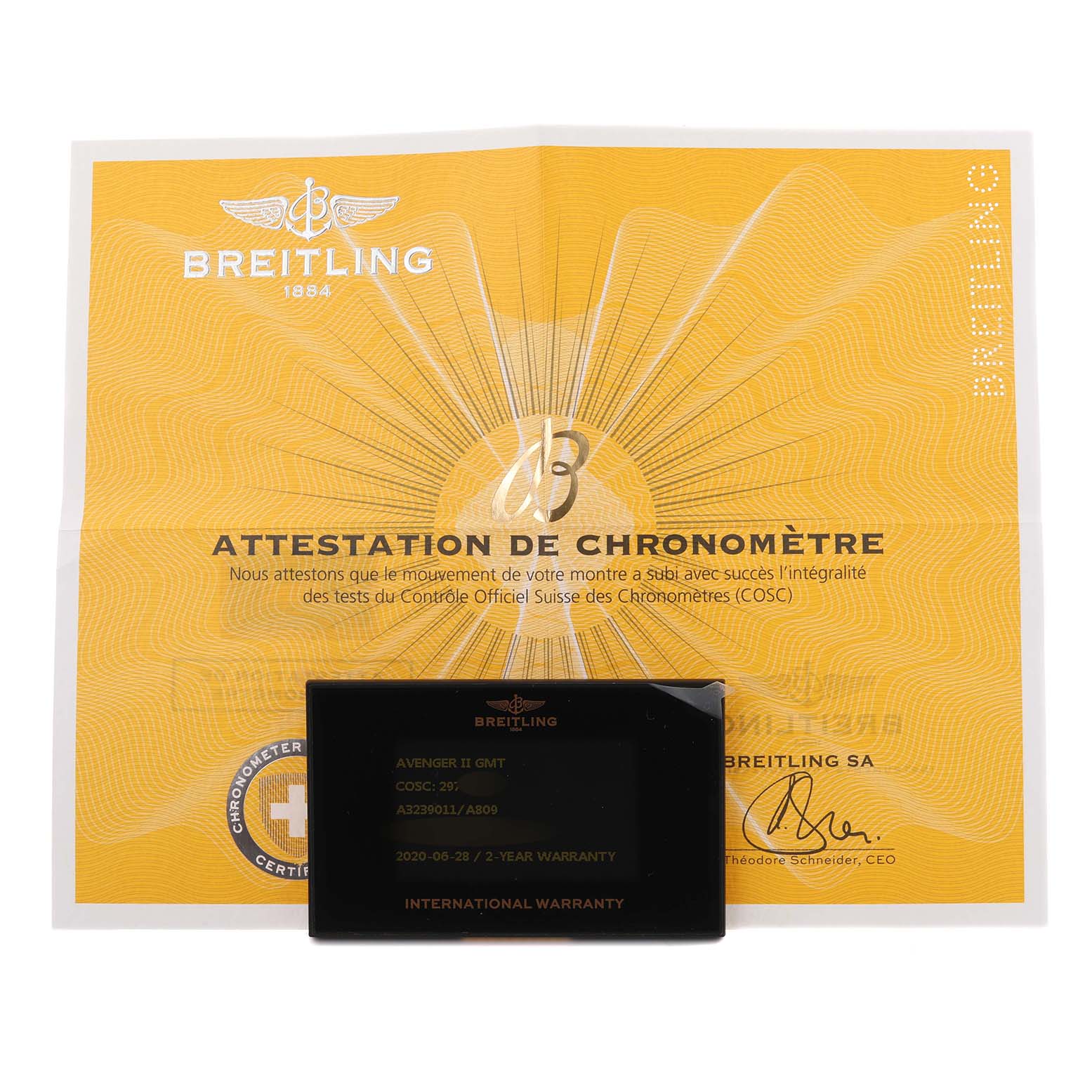 The image shows a Breitling Avenger A3239011/A809 Men's Stainless Steel Mother of Pearl Dial A3239011/A809 Men's Stainless Steel Mother of Pearl Dial model watch's warranty card and chronometer certificate placed together flat.