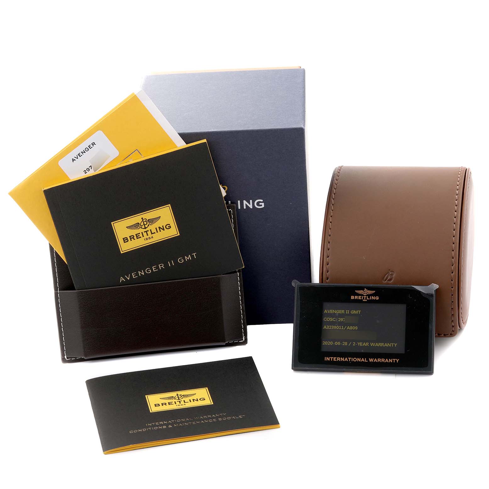 The image shows the accessories for a Breitling Avenger A3239011/A809 Men's Stainless Steel Mother of Pearl Dial A3239011/A809 Men's Stainless Steel Mother of Pearl Dial watch, including manuals, warranty cards, a box, and a leather case.