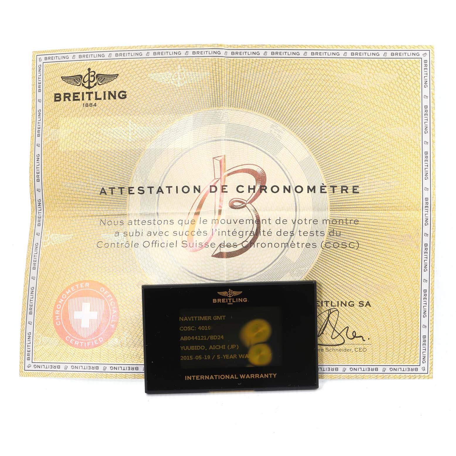 A Breitling Navitimer AB044121/BD24/443A Men's Stainless Steel Black Dial AB044121/BD24/443A Men's Stainless Steel Black Dial model certificate and international warranty card are shown, viewed from above.