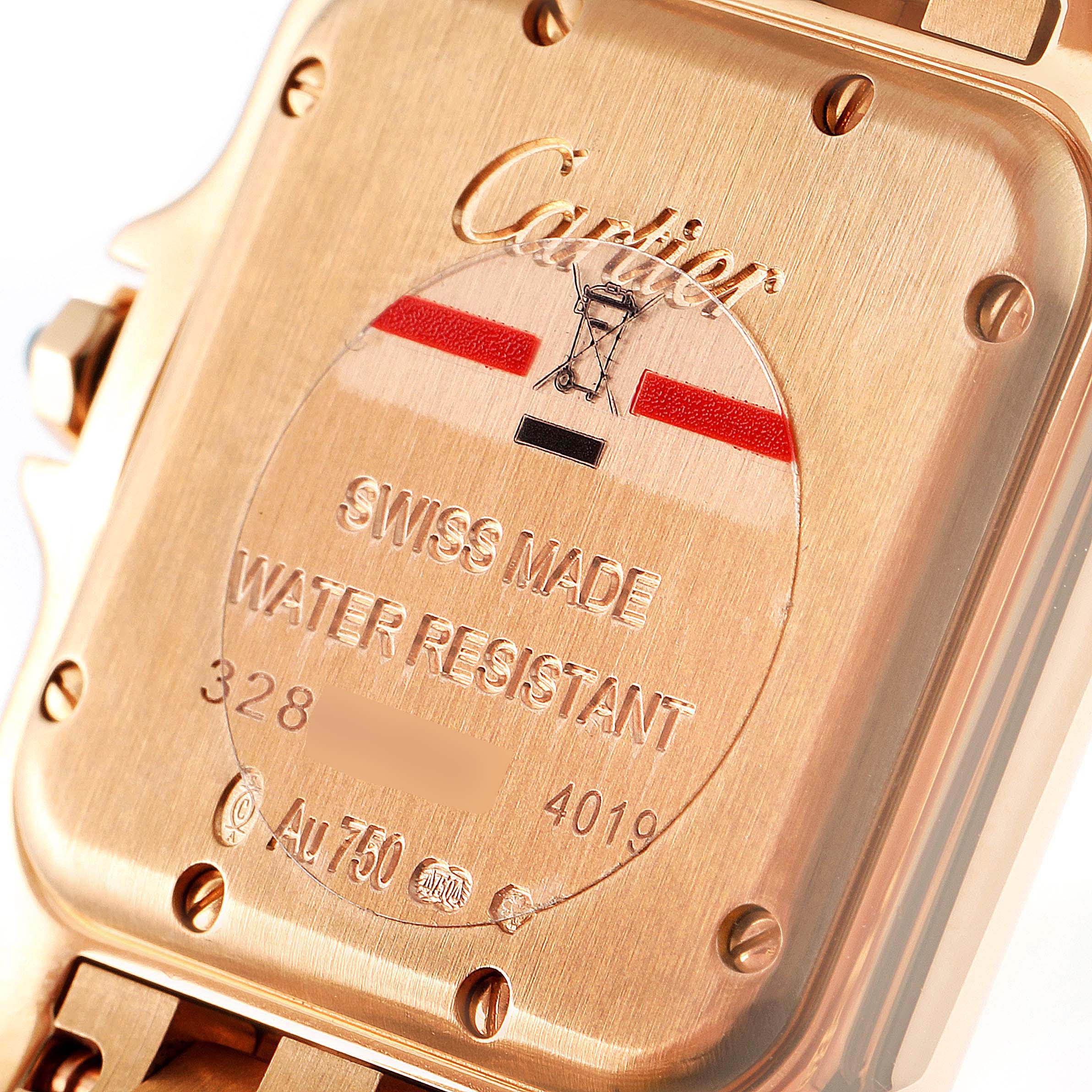 The image shows the back case of a Panthere model by Cartier, highlighting engravings and hallmark details.