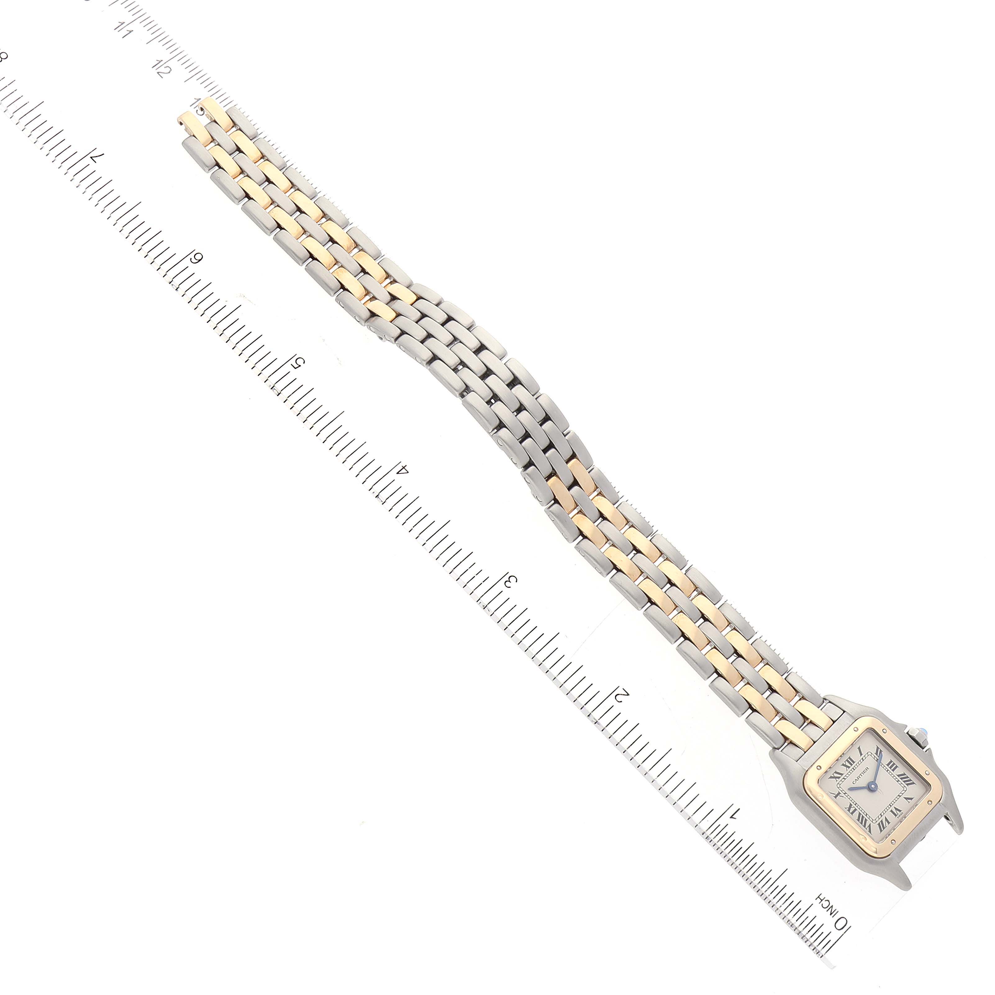 The image shows a top view of a Cartier Panthere W25029B6 Women's Steel and Gold (two tone) Silver Dial W25029B6 Women's Steel and Gold (two tone) Silver Dial watch, highlighting its two-tone gold and silver bracelet and square face.