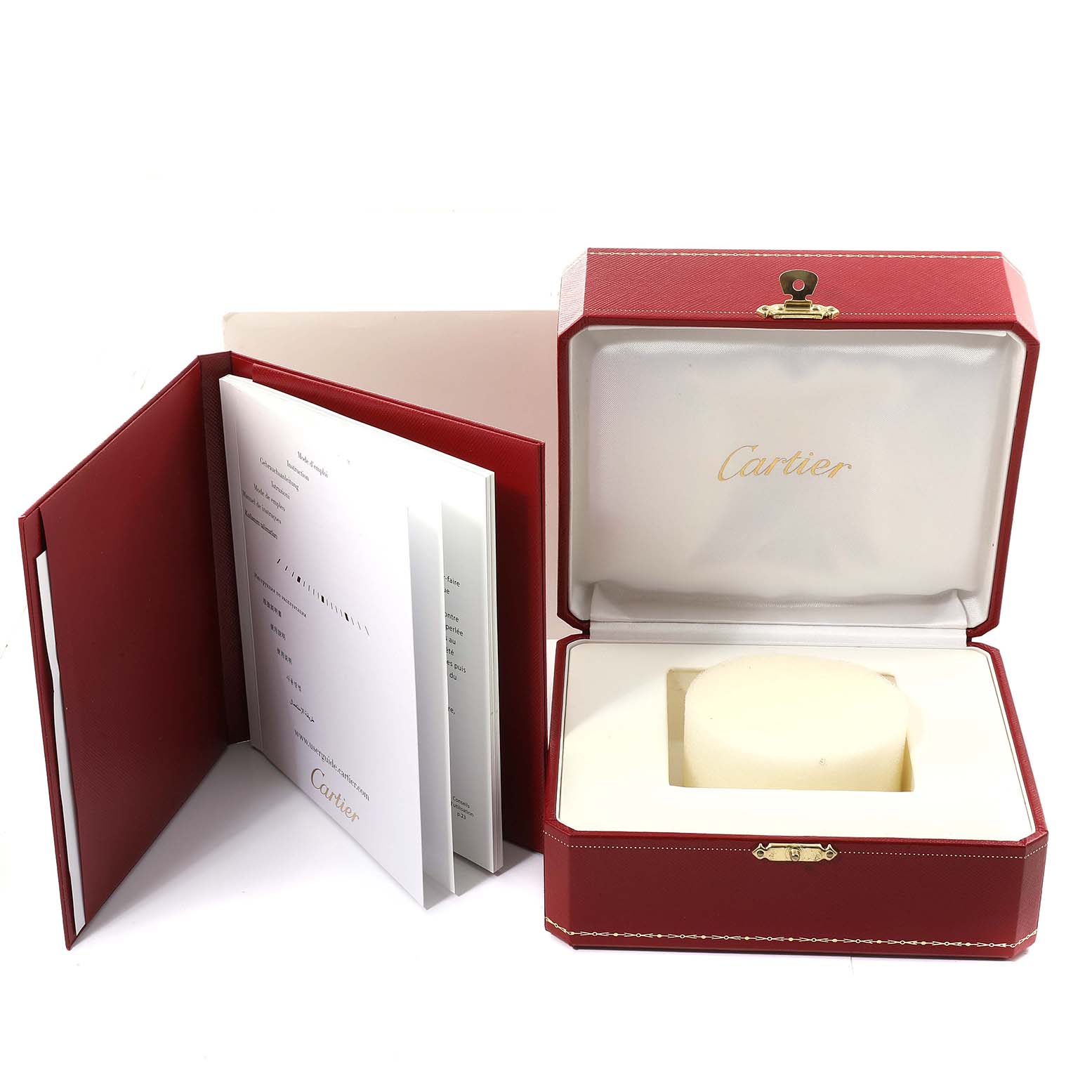 The image shows the red storage box and documentation for the Ronde model by Cartier, with the box open and empty.