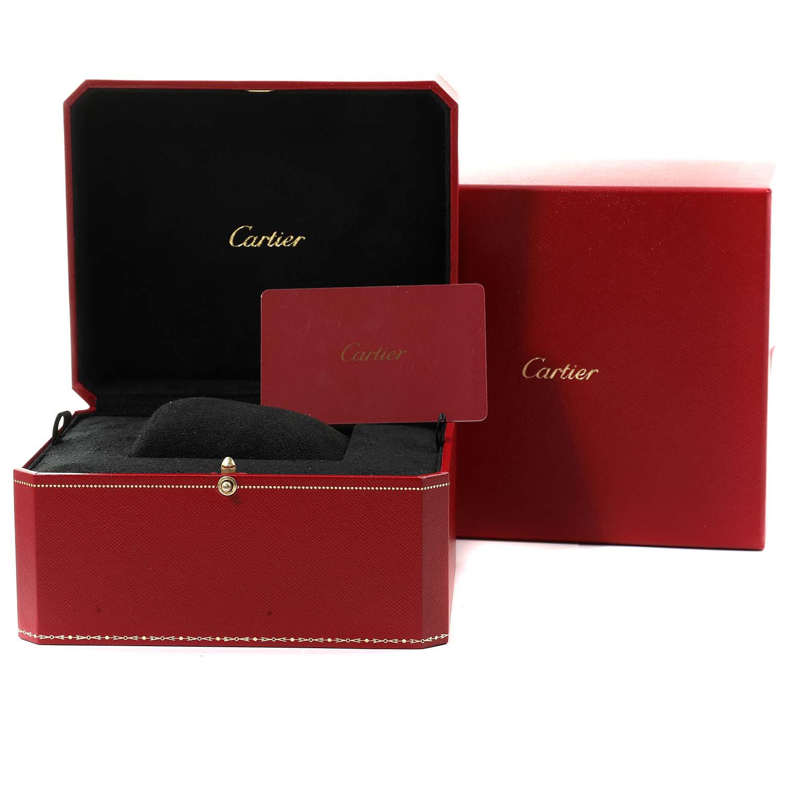 The image shows a red Cartier Ronde W6701011 Men
s Stainless Steel Silver Dial W6701011 Men
s Stainless Steel Silver Dial model watch box, featuring an open interior cushion and a card, with another closed box behind it.