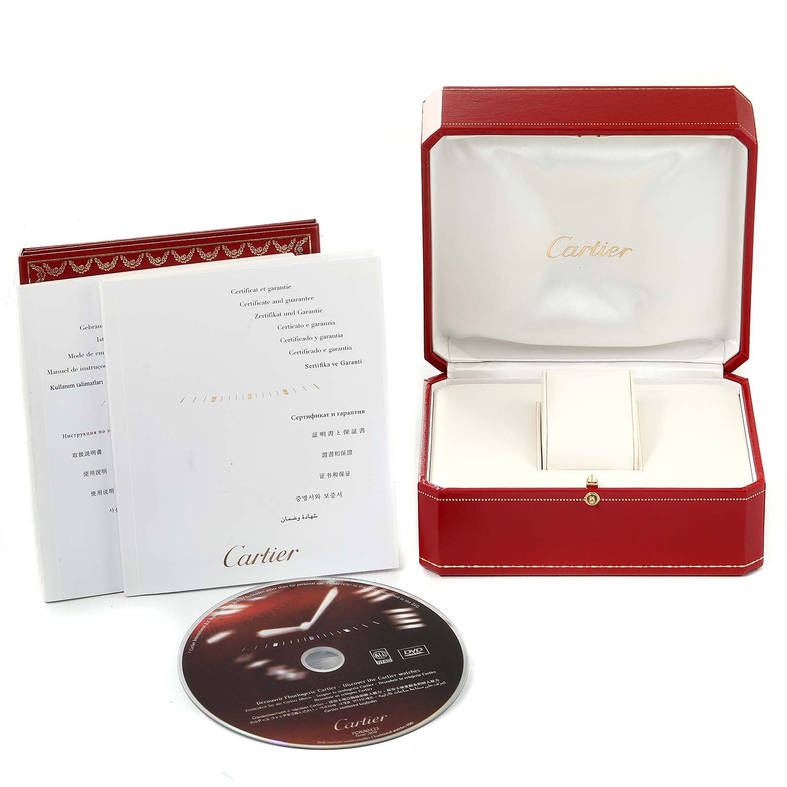 The image shows the Cartier Santos W20099C4 Men's Steel and Gold (two tone) Silver Dial W20099C4 Men's Steel and Gold (two tone) Silver Dial model watch box, a booklet, and a CD, all viewed from a front angle.