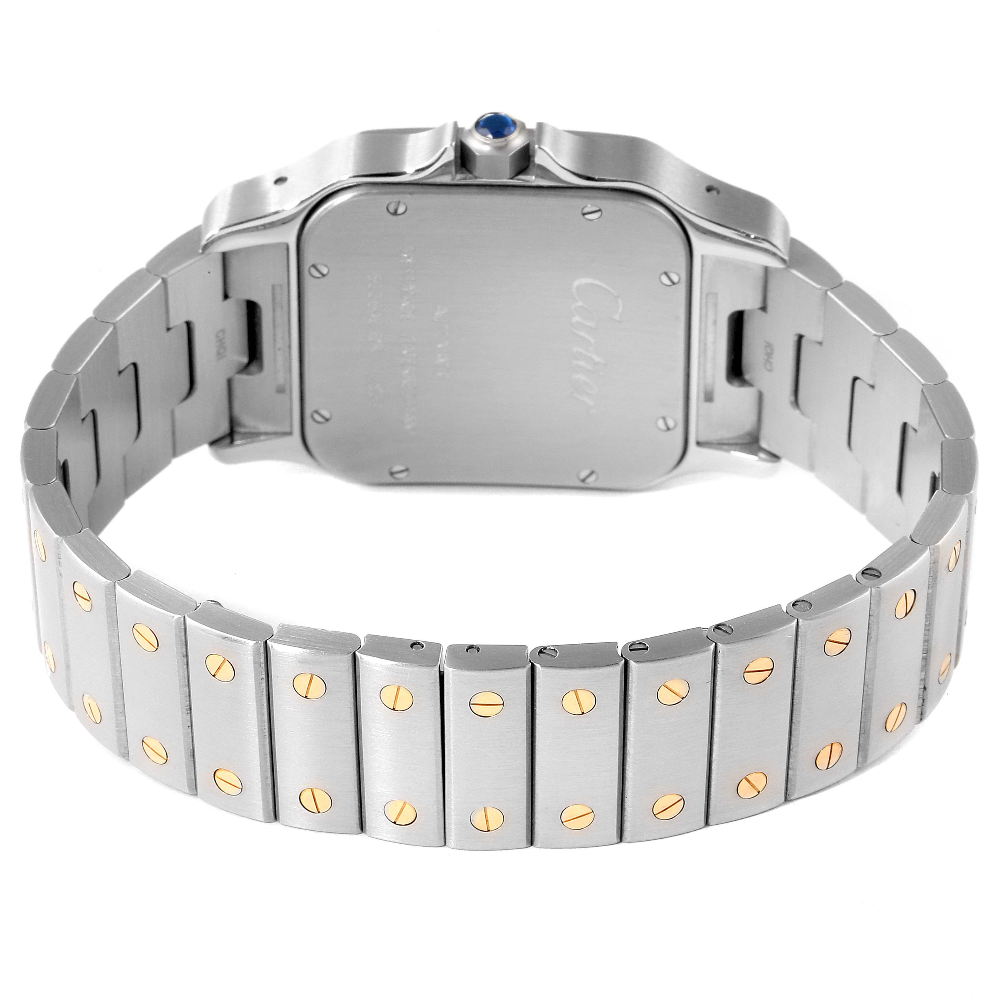 This image shows the back of the Santos model by Cartier, highlighting the bracelet and caseback.