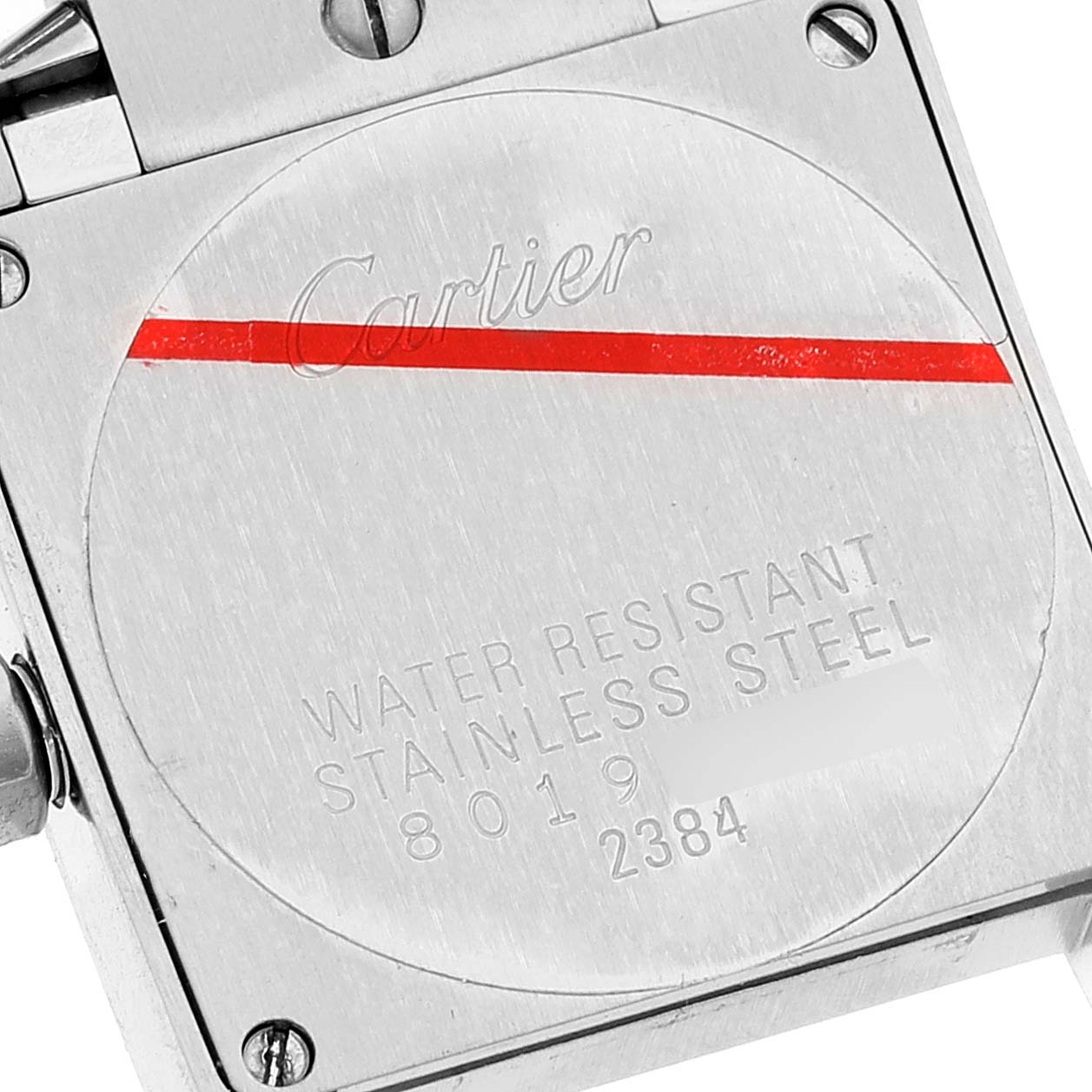 The image shows the back casing of a Cartier Tank Francaise W51028Q3 Women's Stainless Steel Mother of Pearl Dial W51028Q3 Women's Stainless Steel Mother of Pearl Dial watch, highlighting its stainless steel material and water resistance.