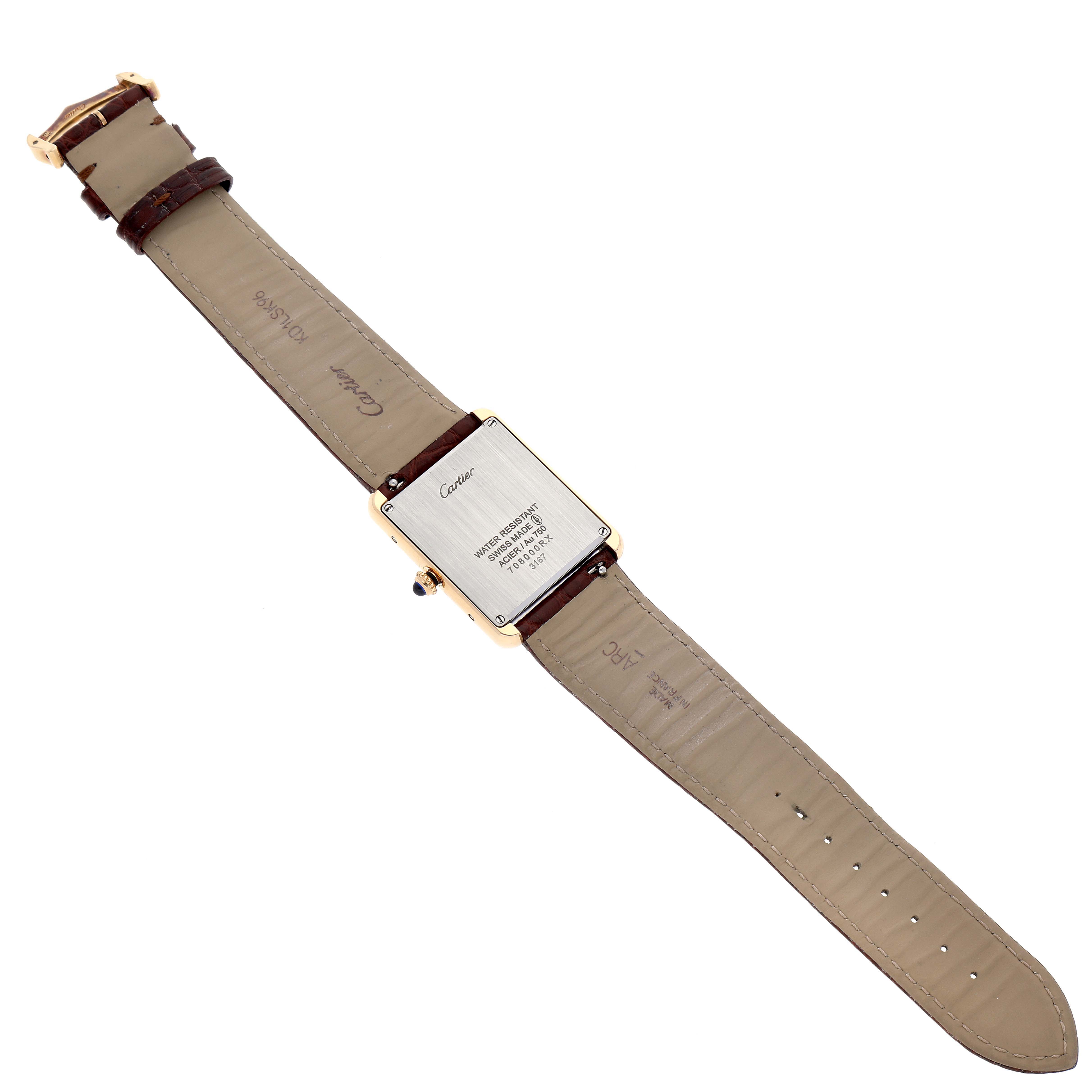 The image shows the back of a Tank Solo model watch by Cartier, including the leather strap and case back.