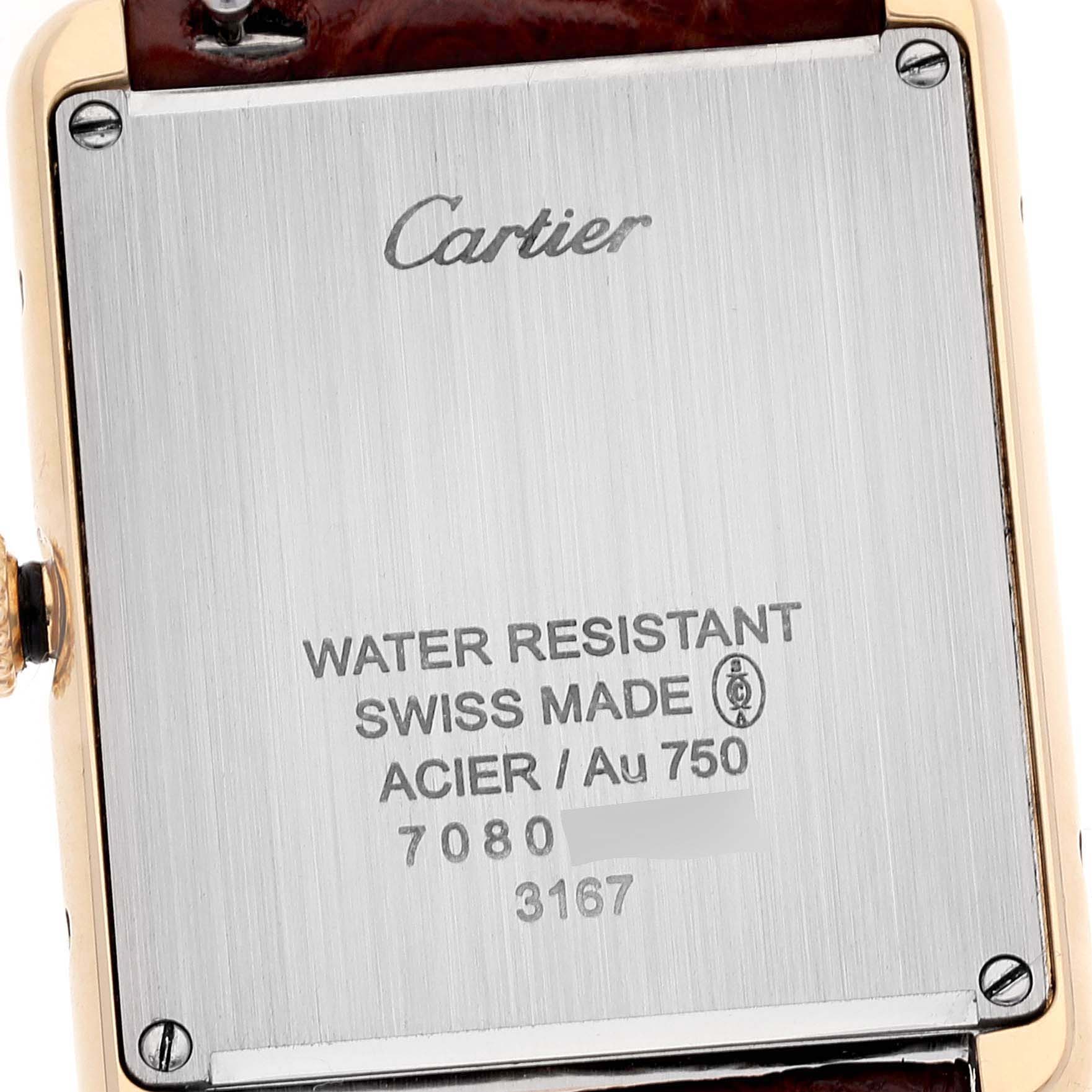 The image shows the back case of a Cartier Tank Solo W5200004 Men's Yellow Gold Silver Dial W5200004 Men's Yellow Gold Silver Dial watch, highlighting the brand logo, water resistance, material, and serial number.