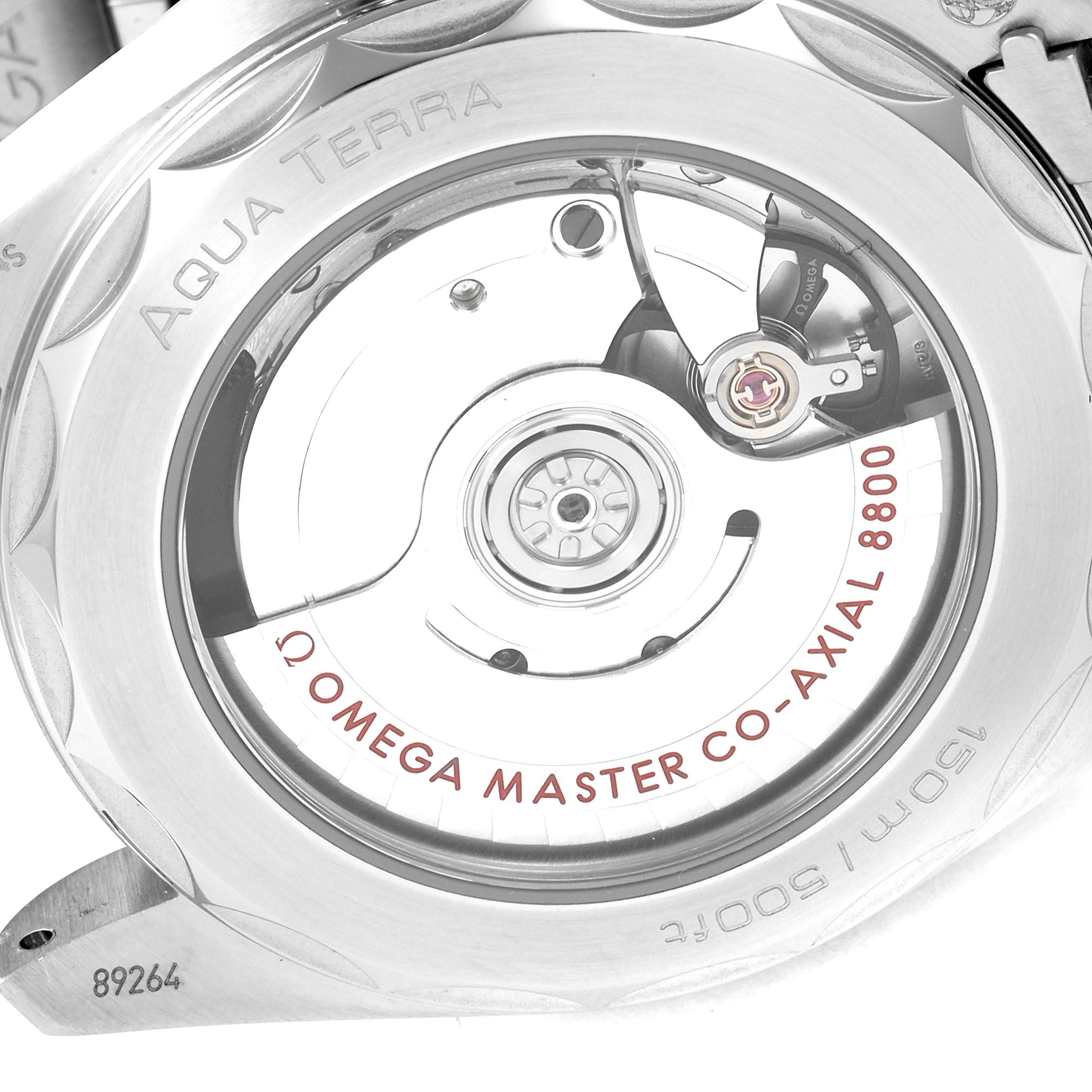 The image shows the back view of the Omega Aqua Terra 220.10.38.20.01.001 Men's Stainless Steel Black Dial 220.10.38.20.01.001 Men's Stainless Steel Black Dial watch, highlighting the Omega Master Co-Axial 8800 movement.