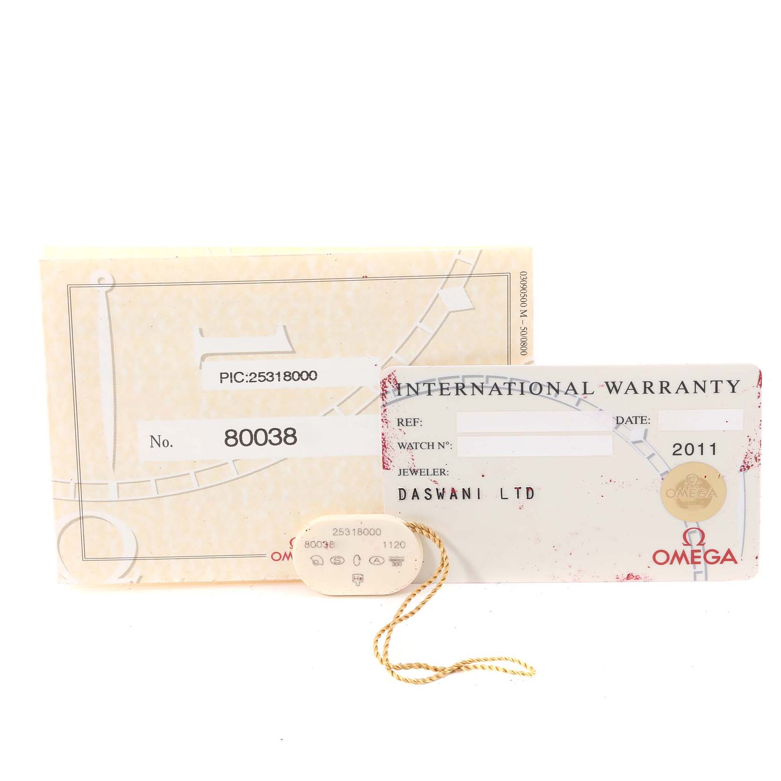 The image shows an International Warranty card, a tag, and packaging for an Omega Seamaster 2531.80.00 Men's Stainless Steel Blue Dial 2531.80.00 Men's Stainless Steel Blue Dial watch.