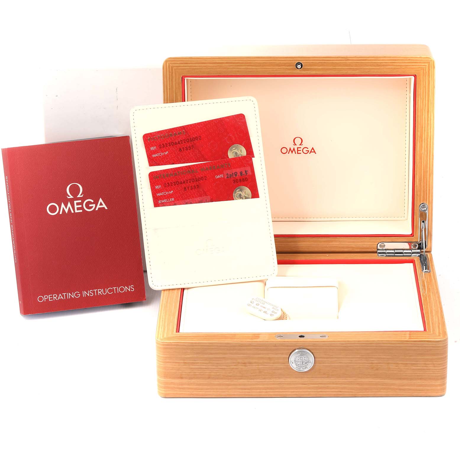 The image shows an Omega Planet Ocean 232.30.44.22.01.002 Men's Stainless Steel Black Dial 232.30.44.22.01.002 Men's Stainless Steel Black Dial box, operating instructions, and warranty cards.