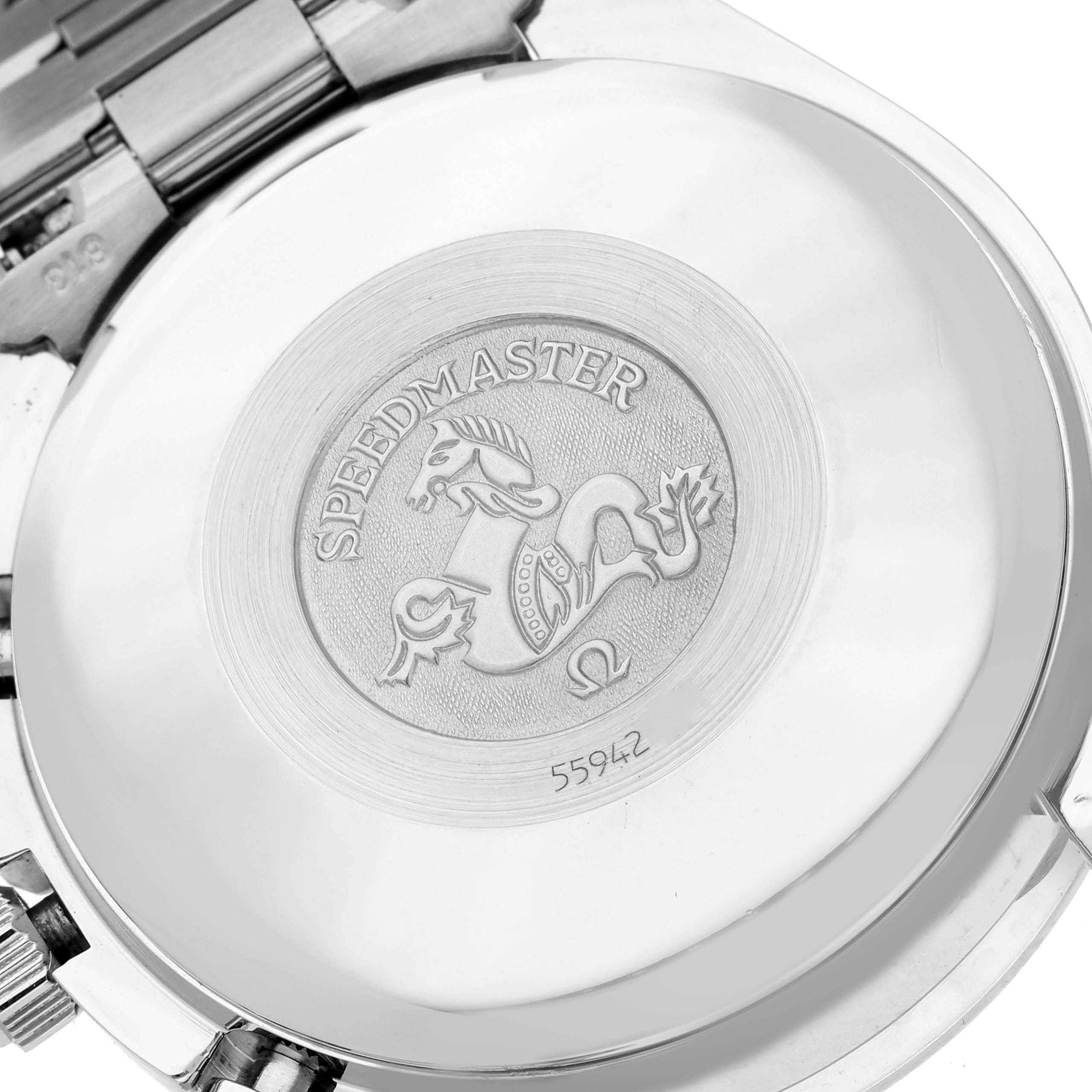 The image shows the back case and partially the bracelet of an Omega Speedmaster 3523.80.00 Men
s Stainless Steel Blue Dial 3523.80.00 Men
s Stainless Steel Blue Dial watch, featuring embossed branding and serial number.