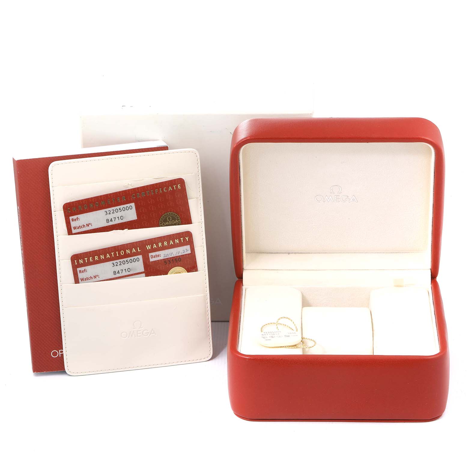 The image shows the warranty cards, certificate, and presentation box for an Omega Speedmaster 3220.50.00 Men
s Stainless Steel Black Dial 3220.50.00 Men
s Stainless Steel Black Dial watch, angled slightly above front view.