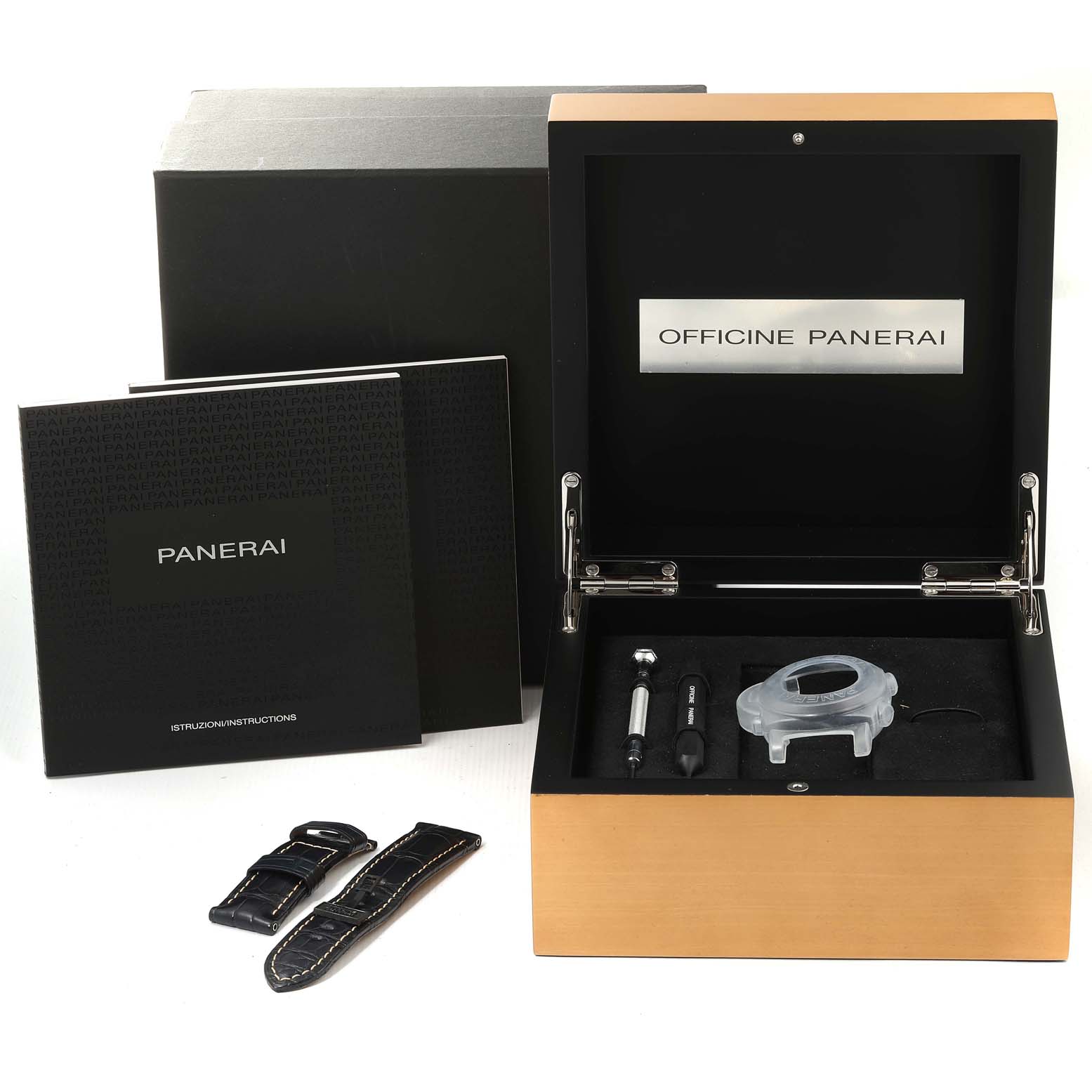 This image shows the packaging box and accessories for a Panerai Luminor PAM01359 Men's Stainless Steel Black Dial PAM01359 Men's Stainless Steel Black Dial watch, including straps, tools, and manuals.