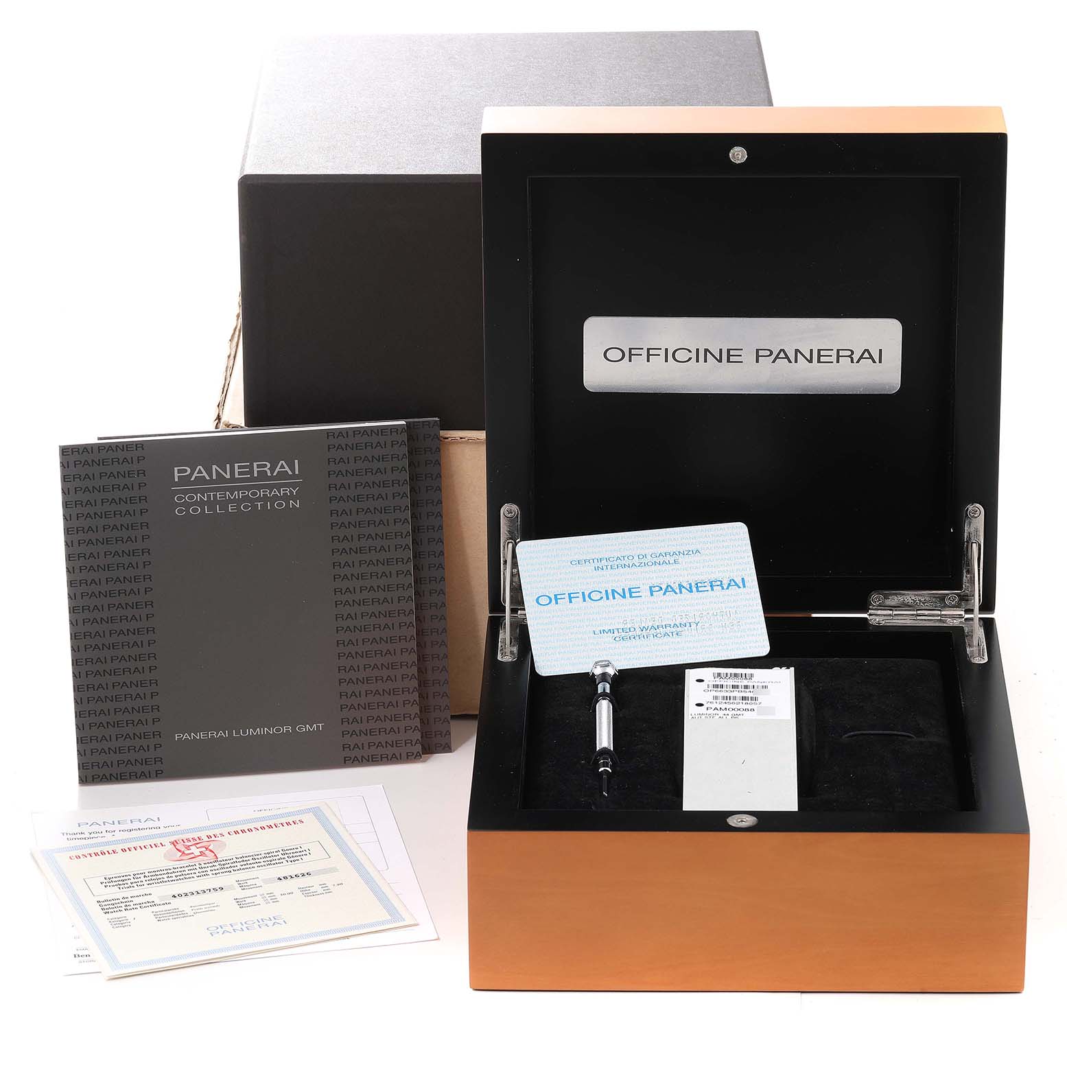 This image shows the packaging and accessories of a Panerai Luminor PAM00088 Men
s Stainless Steel Black Dial PAM00088 Men
s Stainless Steel Black Dial model, including warranty cards, manuals, a tool, and the watch box.