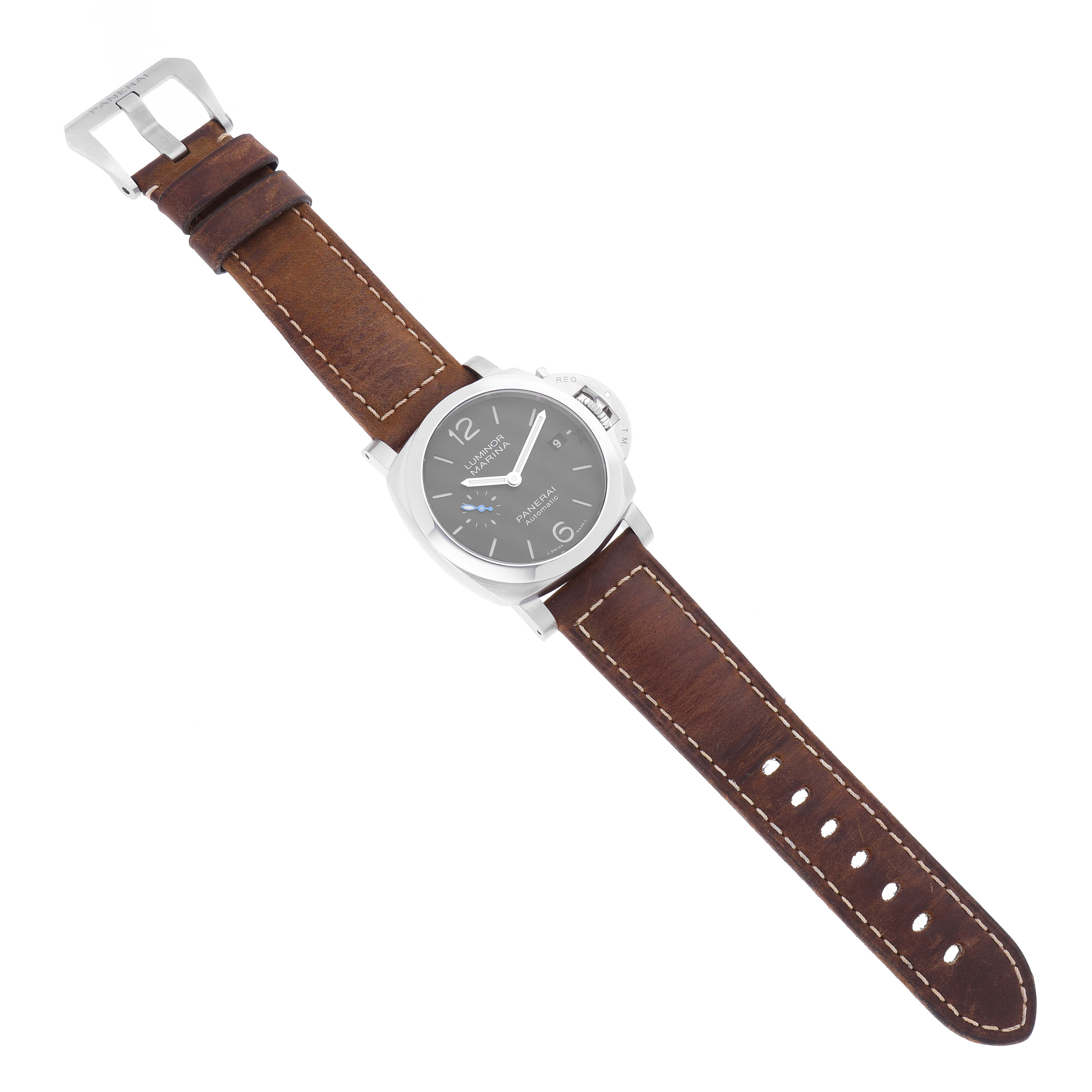 This image shows a Panerai Luminor PAM01272 Men's Stainless Steel Black Dial PAM01272 Men's Stainless Steel Black Dial watch with a brown leather strap, viewed from a top-down angle.