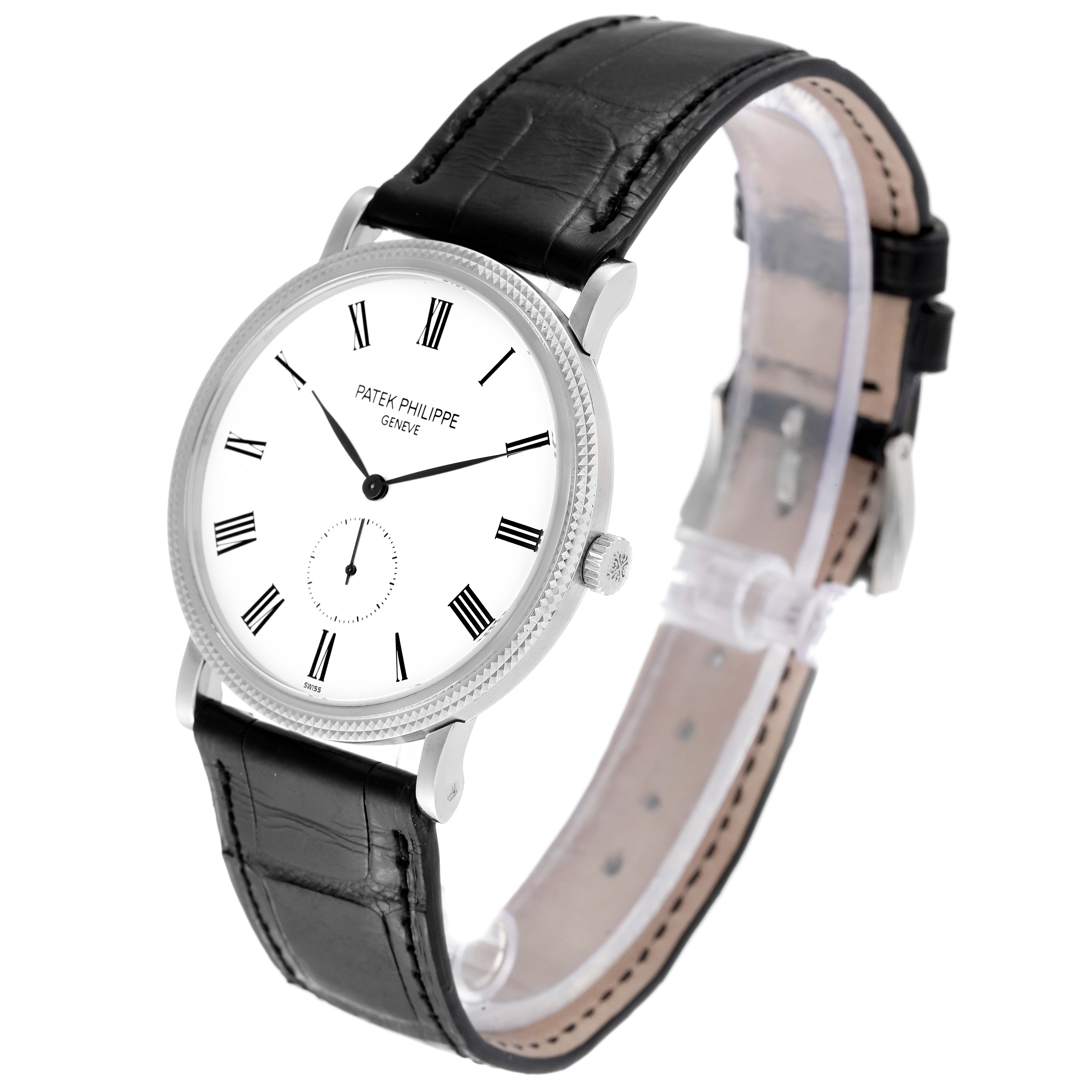The image shows a Patek Philippe Calatrava 5119G Men's White Gold White Dial 5119G Men's White Gold White Dial watch at a three-quarter angle, highlighting its dial, case, and strap.